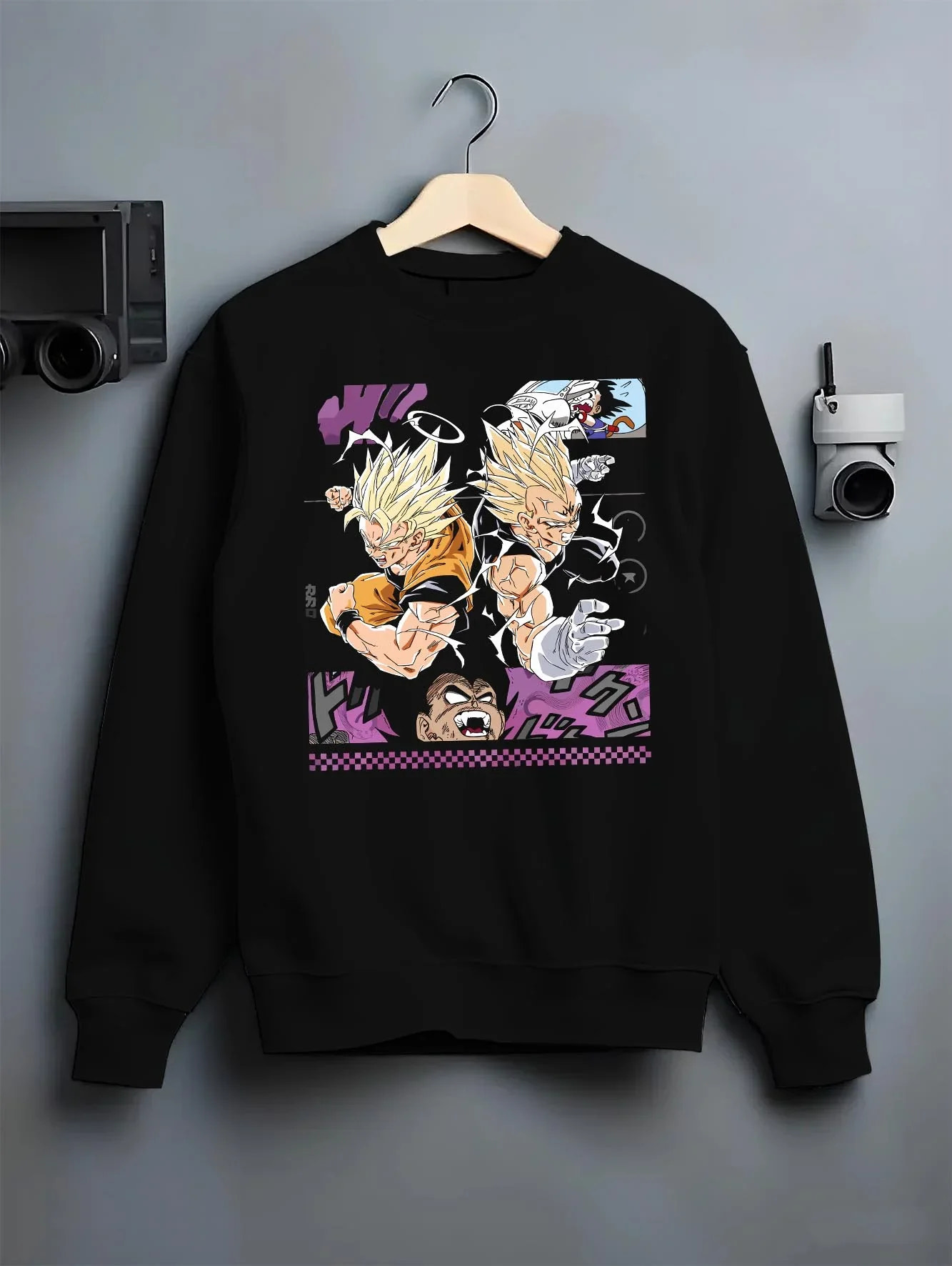 Black crewneck sweatshirt on hanger with Goku Hoodie Dragon Ball Z Super Saiyan Epic Pose graphic premium wear.