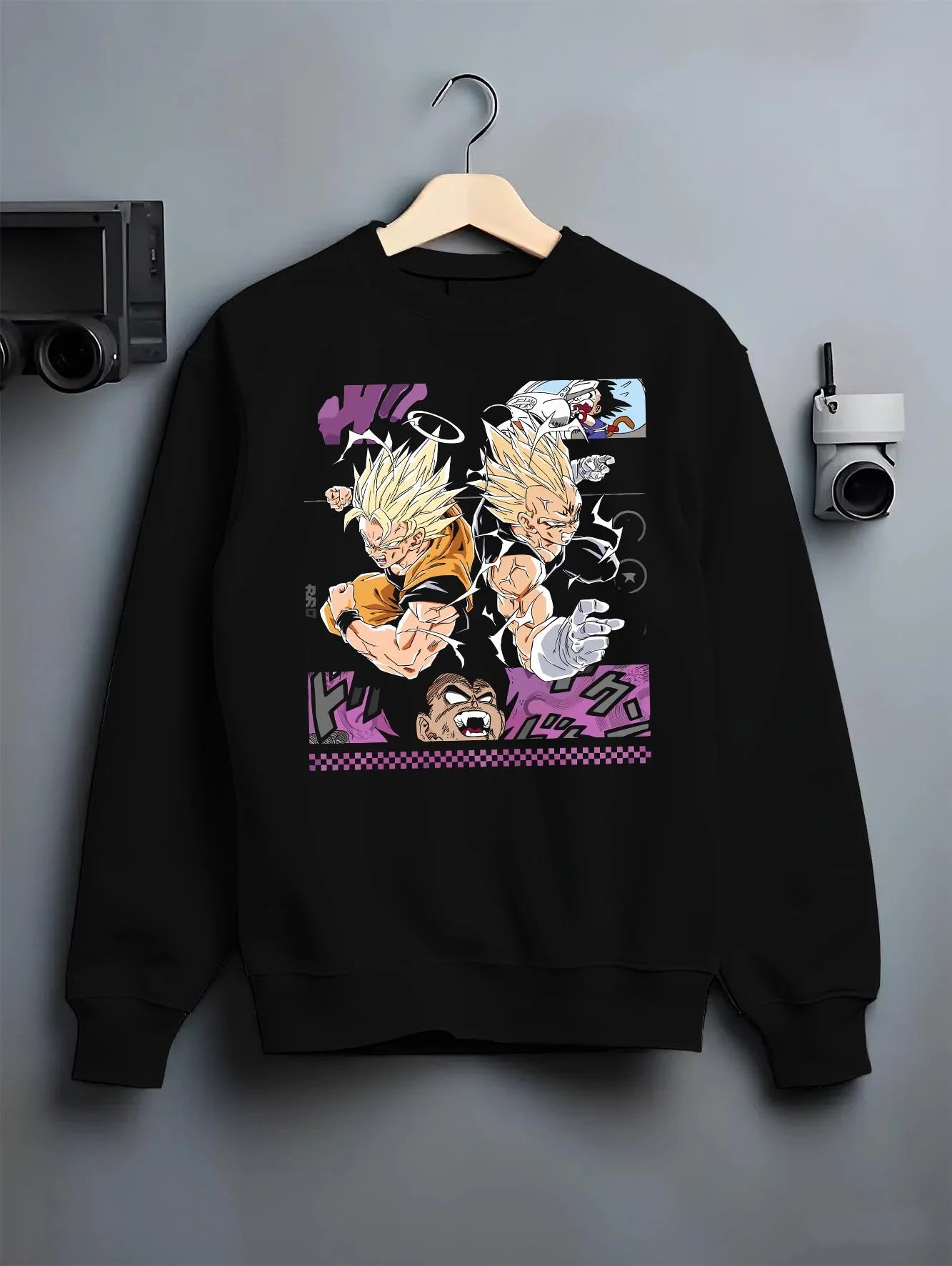 Black crewneck sweatshirt on hanger with Goku Hoodie Dragon Ball Z Super Saiyan Epic Pose graphic premium wear.