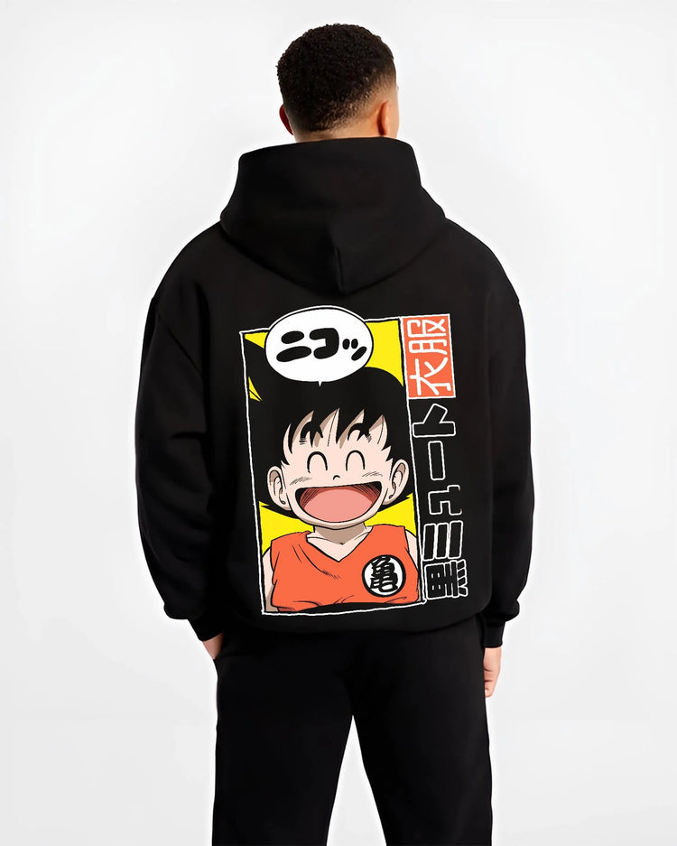 Black hoodie worn by male model, back view with Krillin Hoodie Dragon Ball Retro Nimbus Flying Pose graphic premium wear.