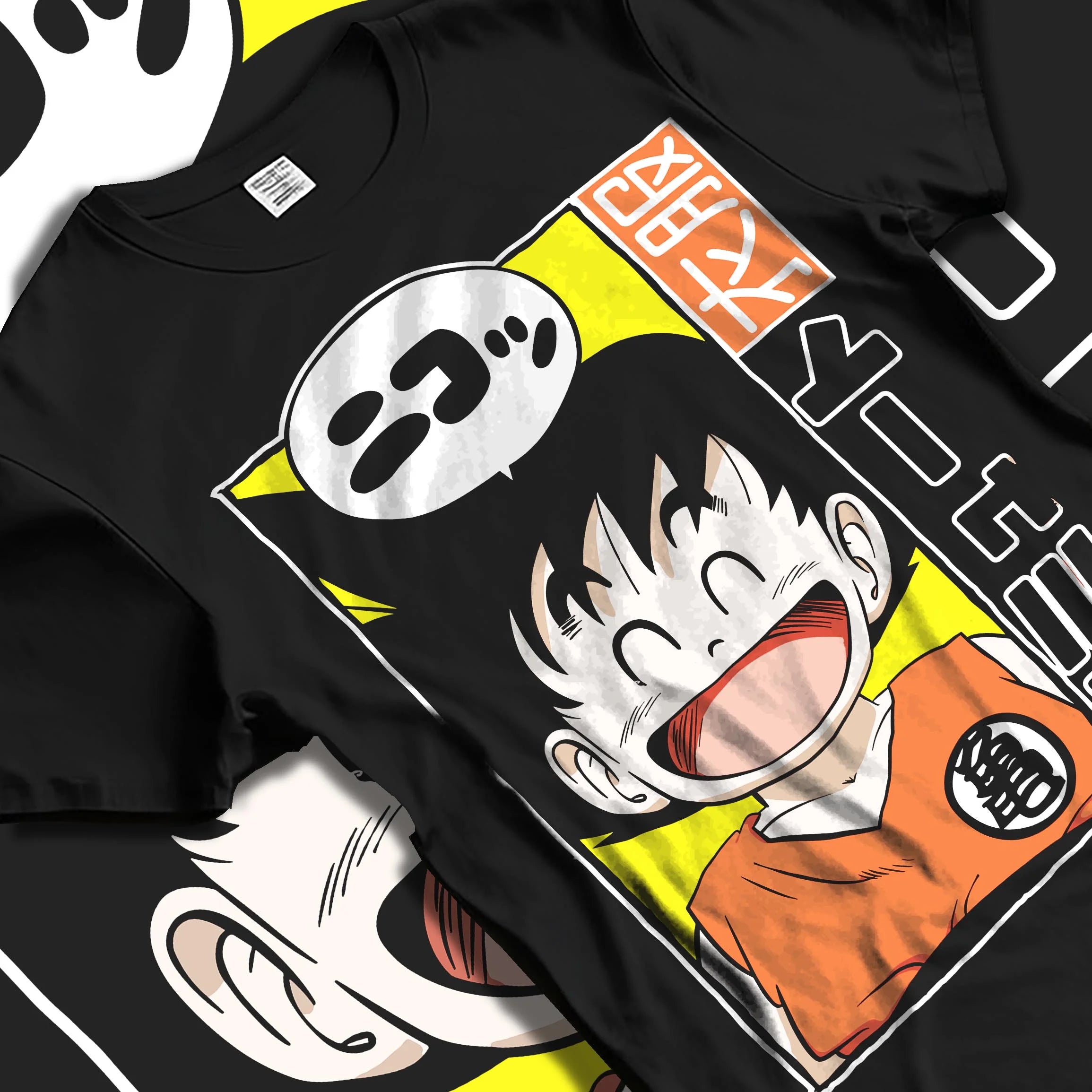Black T-shirt laid flat with natural folds with Krillin Hoodie Dragon Ball Retro Nimbus Flying Pose graphic bold anime graphic.