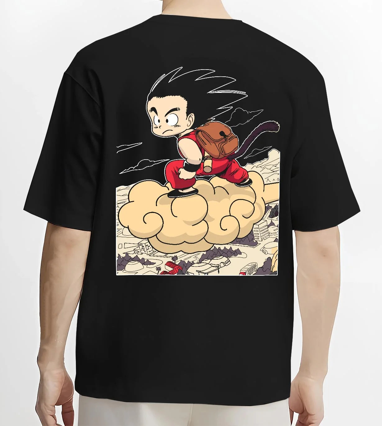 Black T-shirt worn by male model, back view with Goku Hoodie Dragon Ball Kid Nimbus Cloud Adventure graphic premium wear.