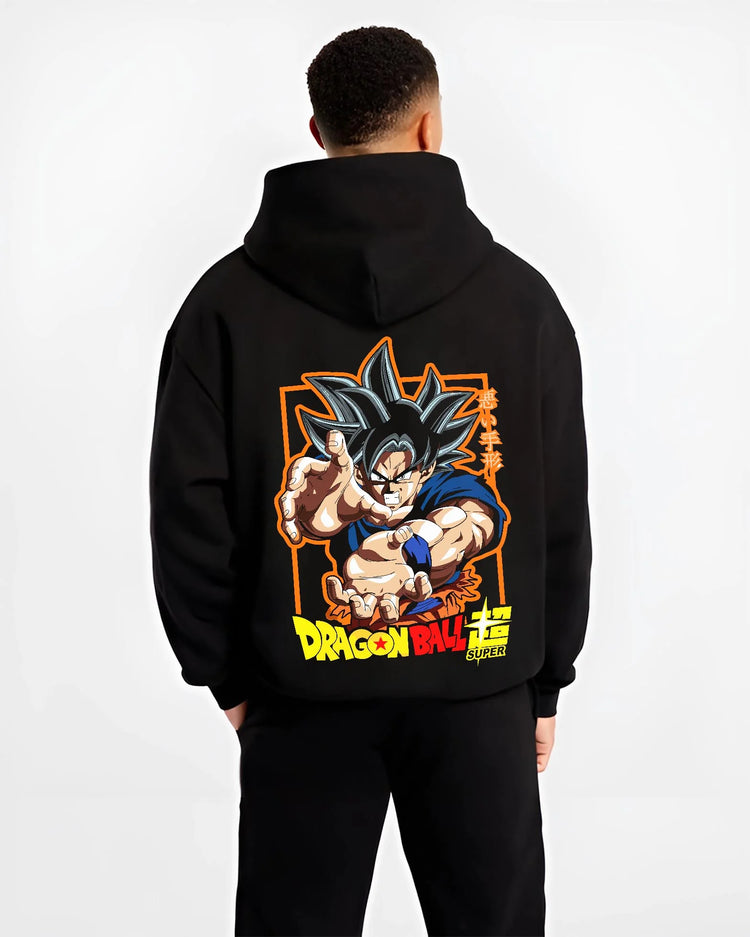 Black hoodie worn by male model, back view with Goku Hoodie Dragon Ball Super Ultra Instinct Power graphic bold anime graphic.