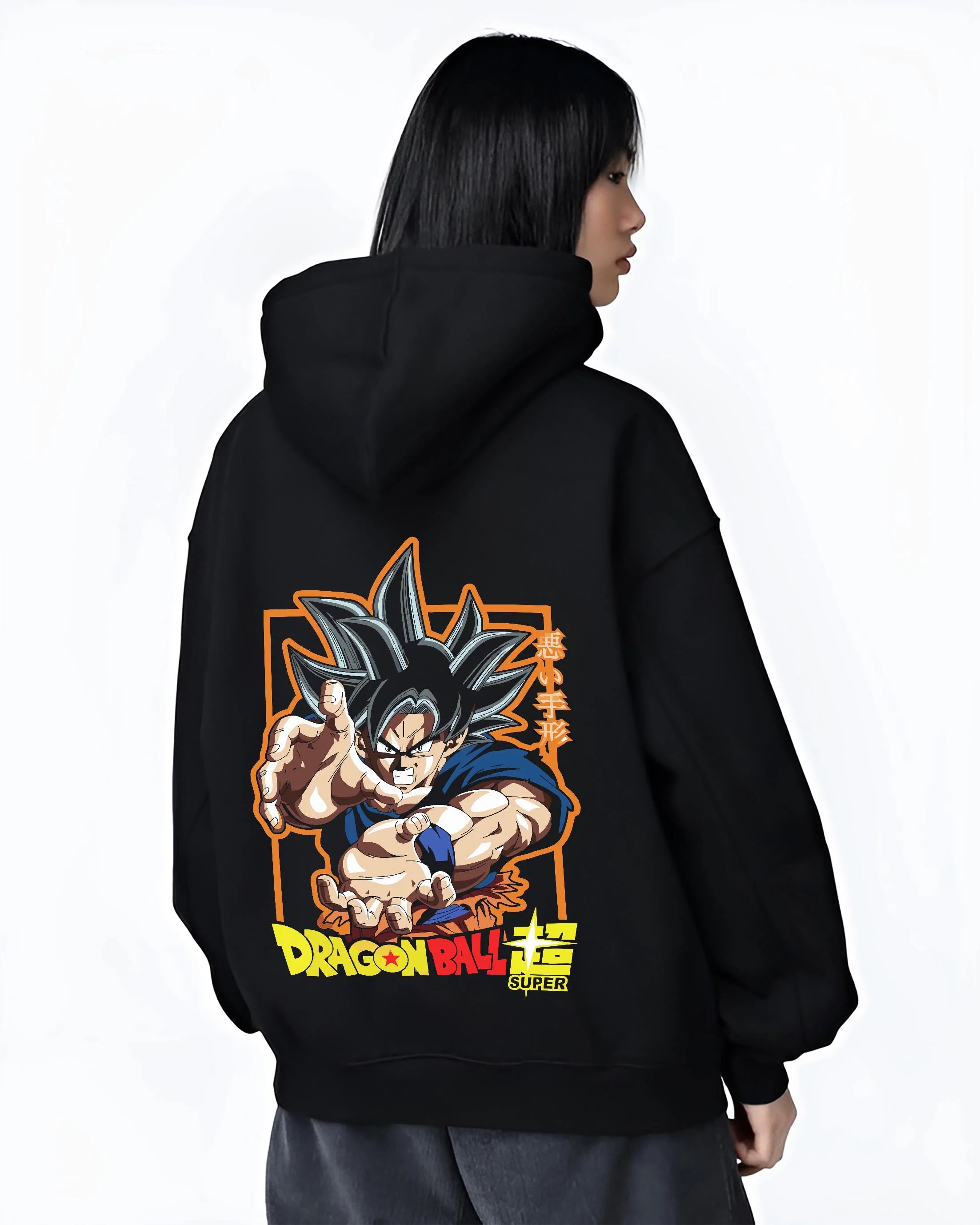 Black hoodie worn by female model, back view with Goku Hoodie Dragon Ball Super Ultra Instinct Power graphic streetwear graphic.