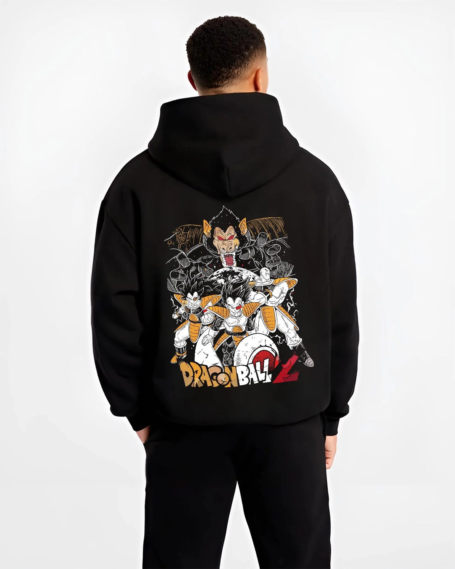 Black hoodie worn by male model, back view with Vegeta Hoodie Dragon Ball Z Saiyan Group Battle graphic streetwear graphic.