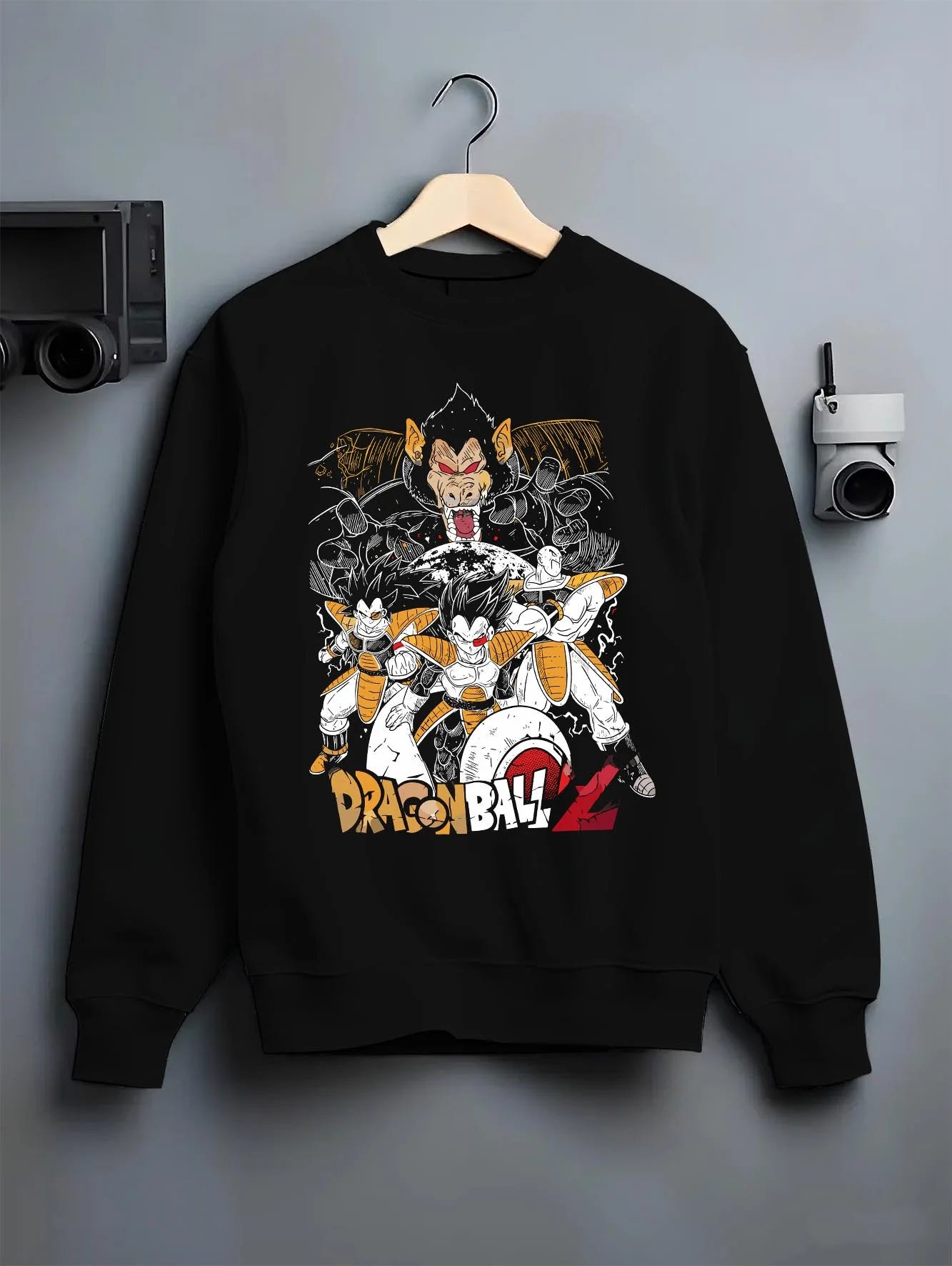Black crewneck sweatshirt on hanger with Vegeta Hoodie Dragon Ball Z Saiyan Group Battle graphic Vegeta anime design.