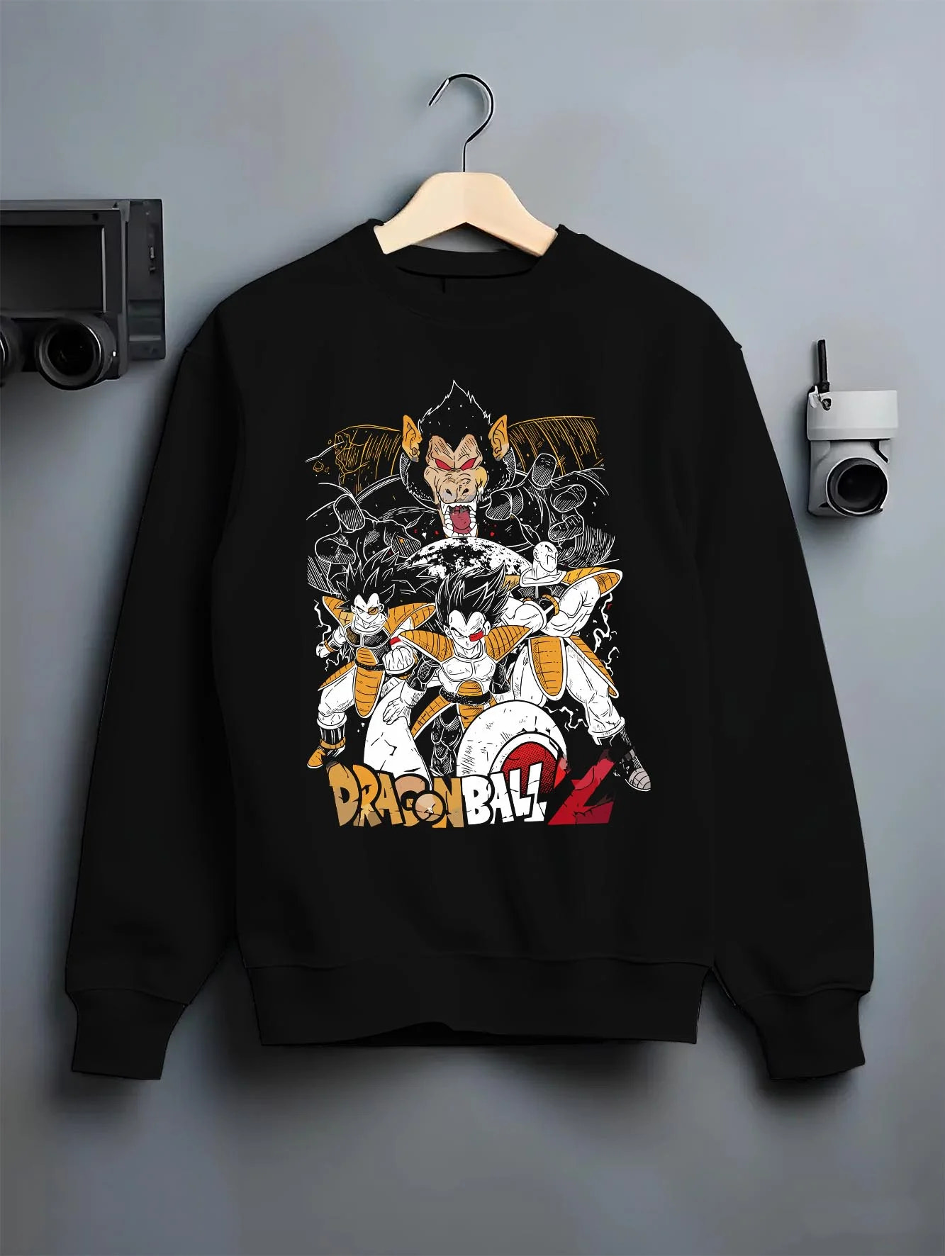Black crewneck sweatshirt on hanger with Vegeta Hoodie Dragon Ball Z Saiyan Group Battle graphic Vegeta anime design.