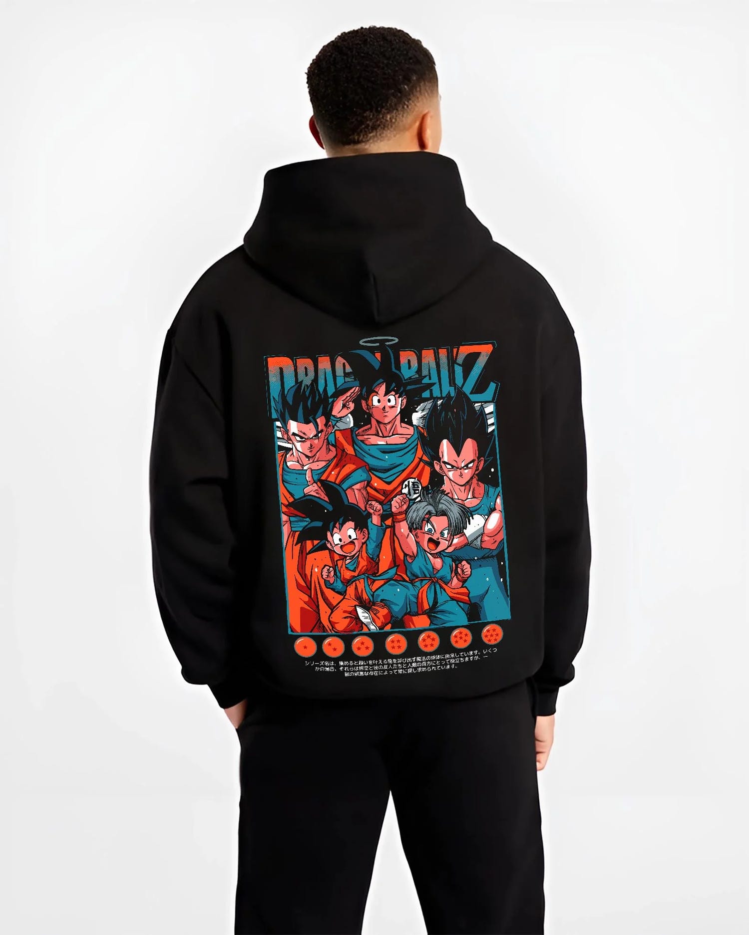 Black hoodie worn by male model, back view with Dragon Ball Hoodie Z Fighters Team Retro Collage graphic streetwear graphic.