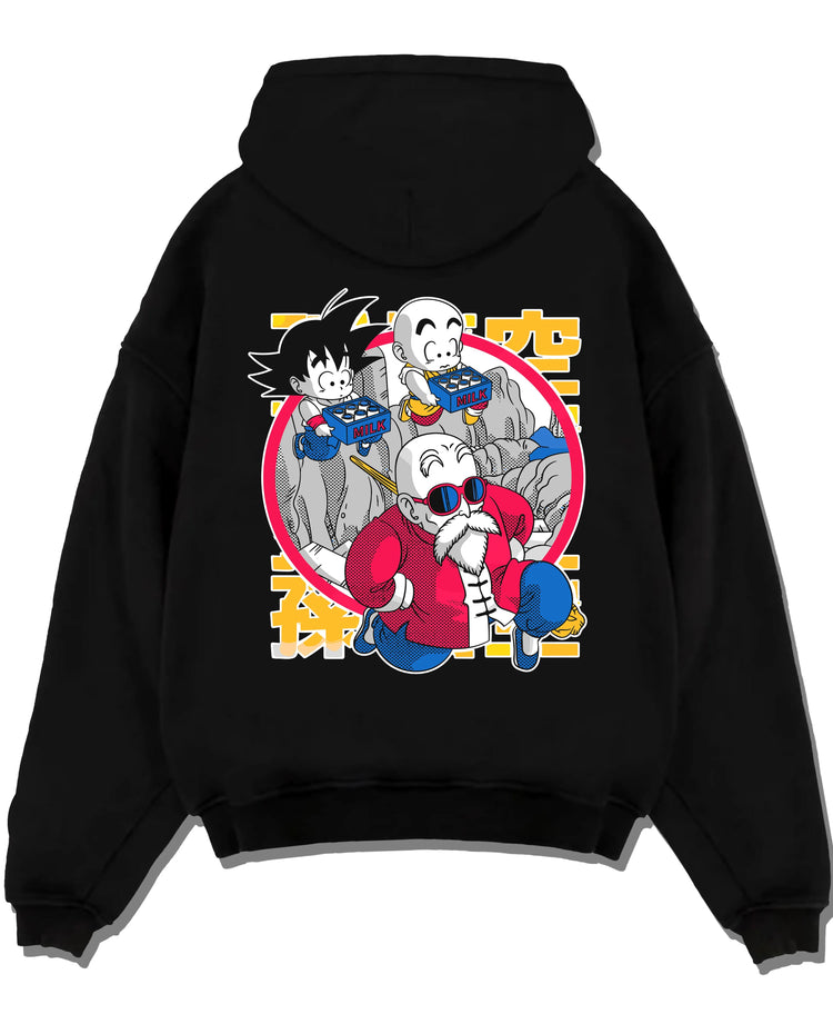 Black pullover hoodie laid flat with Dragon Ball Hoodie Krillin Retro Training White Gi graphic bold anime graphic.