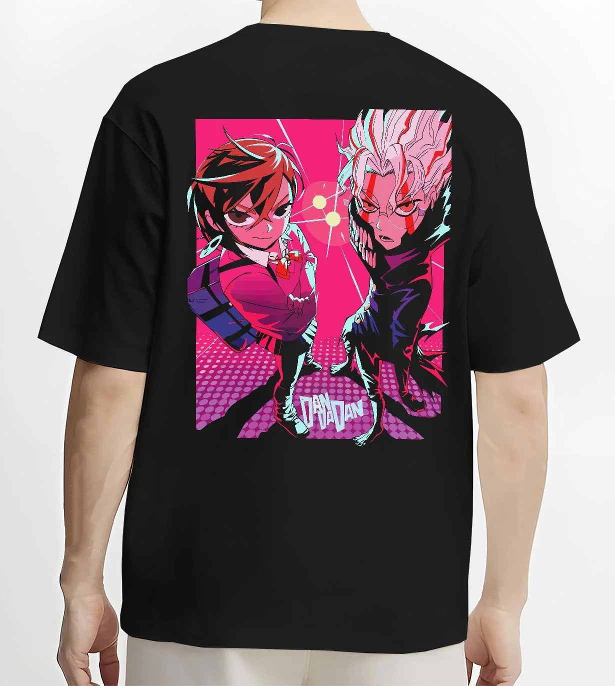 Black T-shirt worn by male model, back view with Dandadan Duo Hoodie Paranormal Adventure Retro Anime graphic streetwear graphic.
