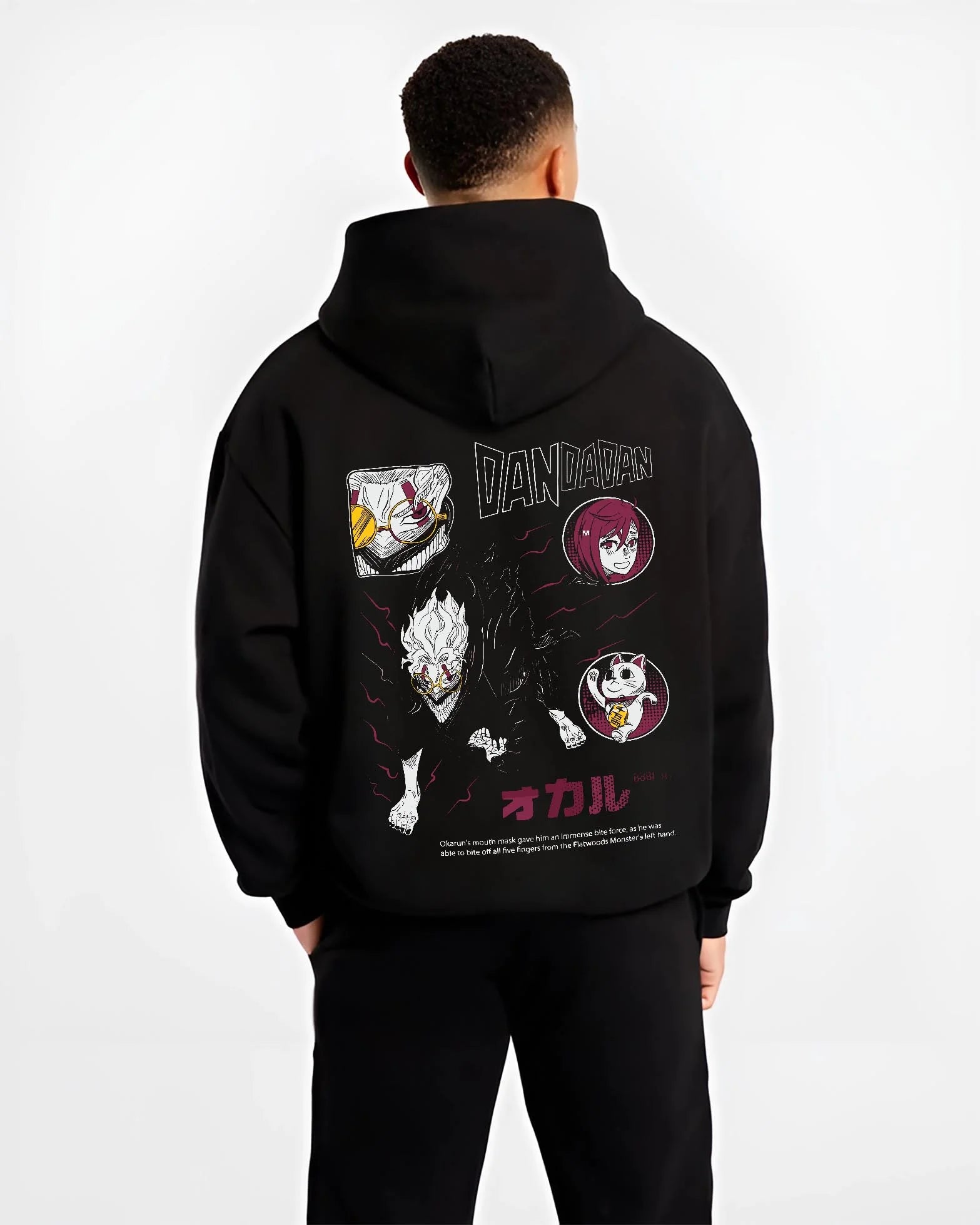 Black hoodie worn by male model, back view with Dandadan Hoodie Paranormal Battle Horror Retro Print graphic bold anime graphic.