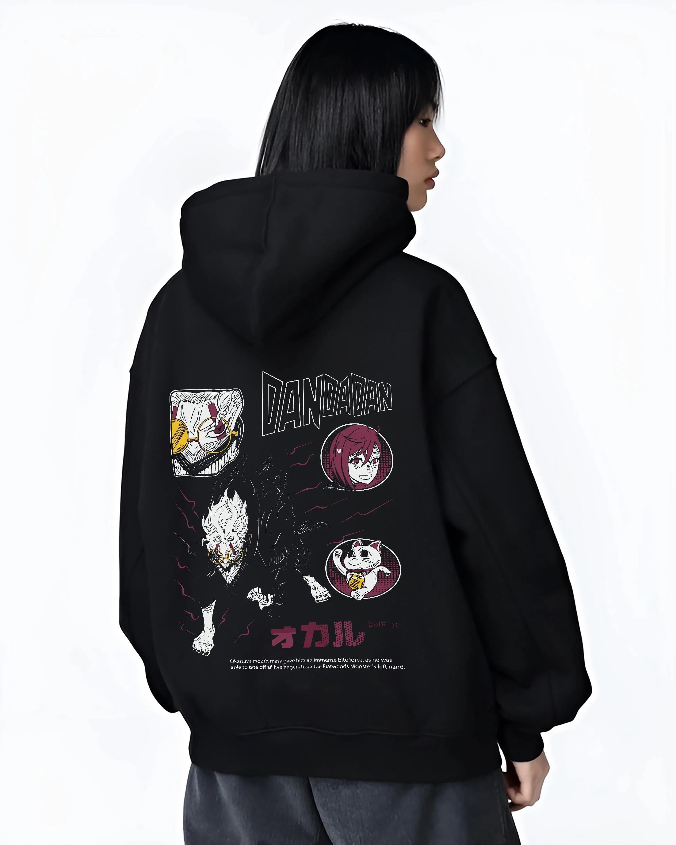 Black hoodie worn by female model, back view with Dandadan Hoodie Paranormal Battle Horror Retro Print graphic streetwear graphic.