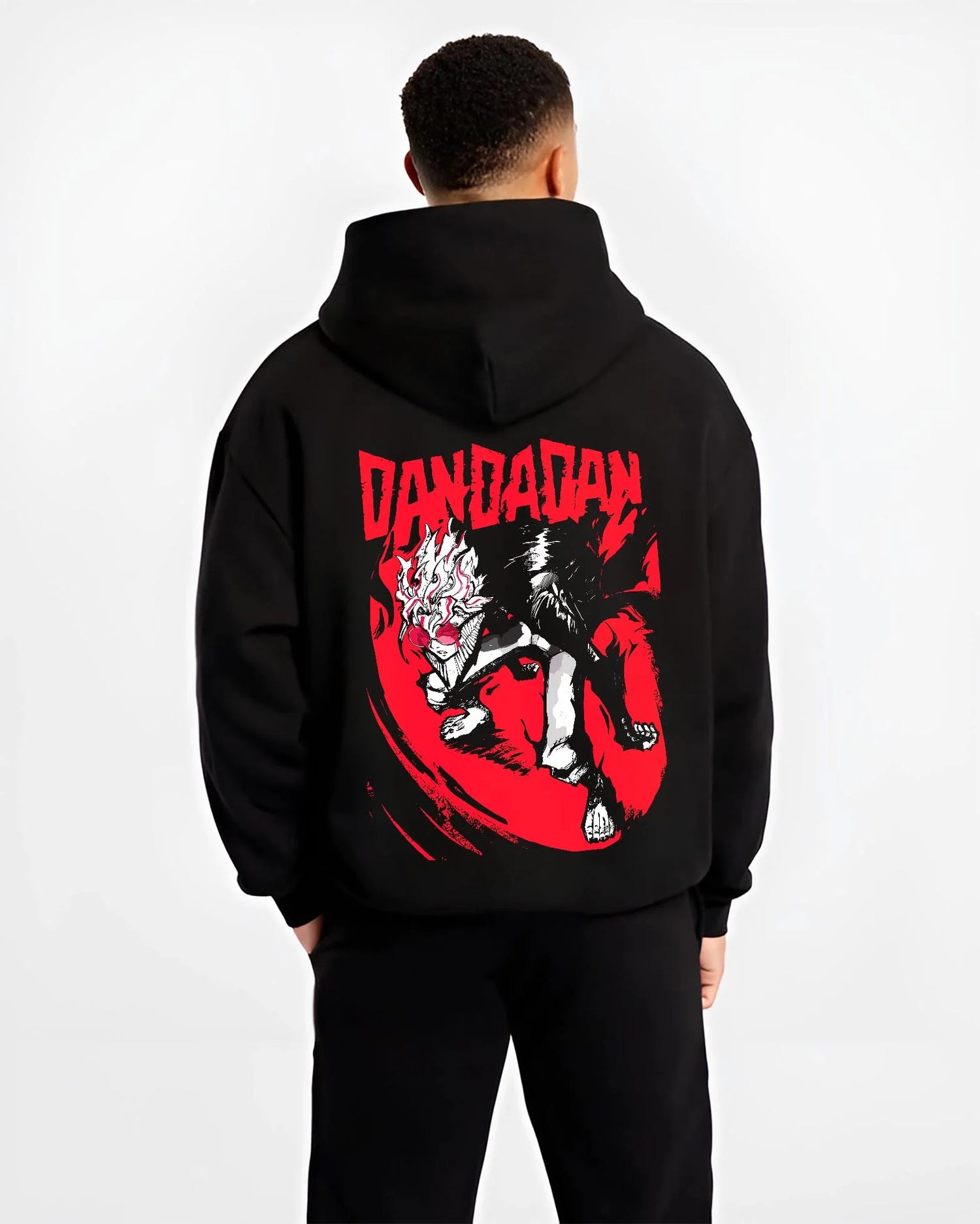 Black hoodie worn by male model, back view with Dandadan Hoodie Retro Anime Occult Spirit Adventure graphic nan anime design.