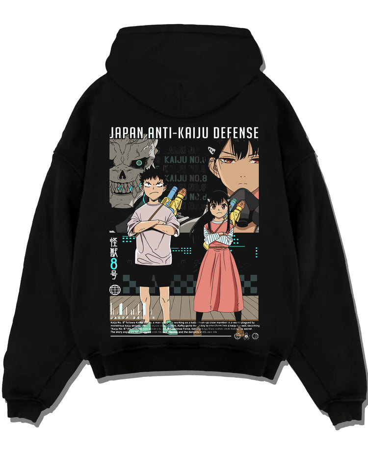 Black pullover hoodie laid flat with Kaiju No. 8 Hoodie Defence Corps Protection Jumper graphic bold anime graphic.