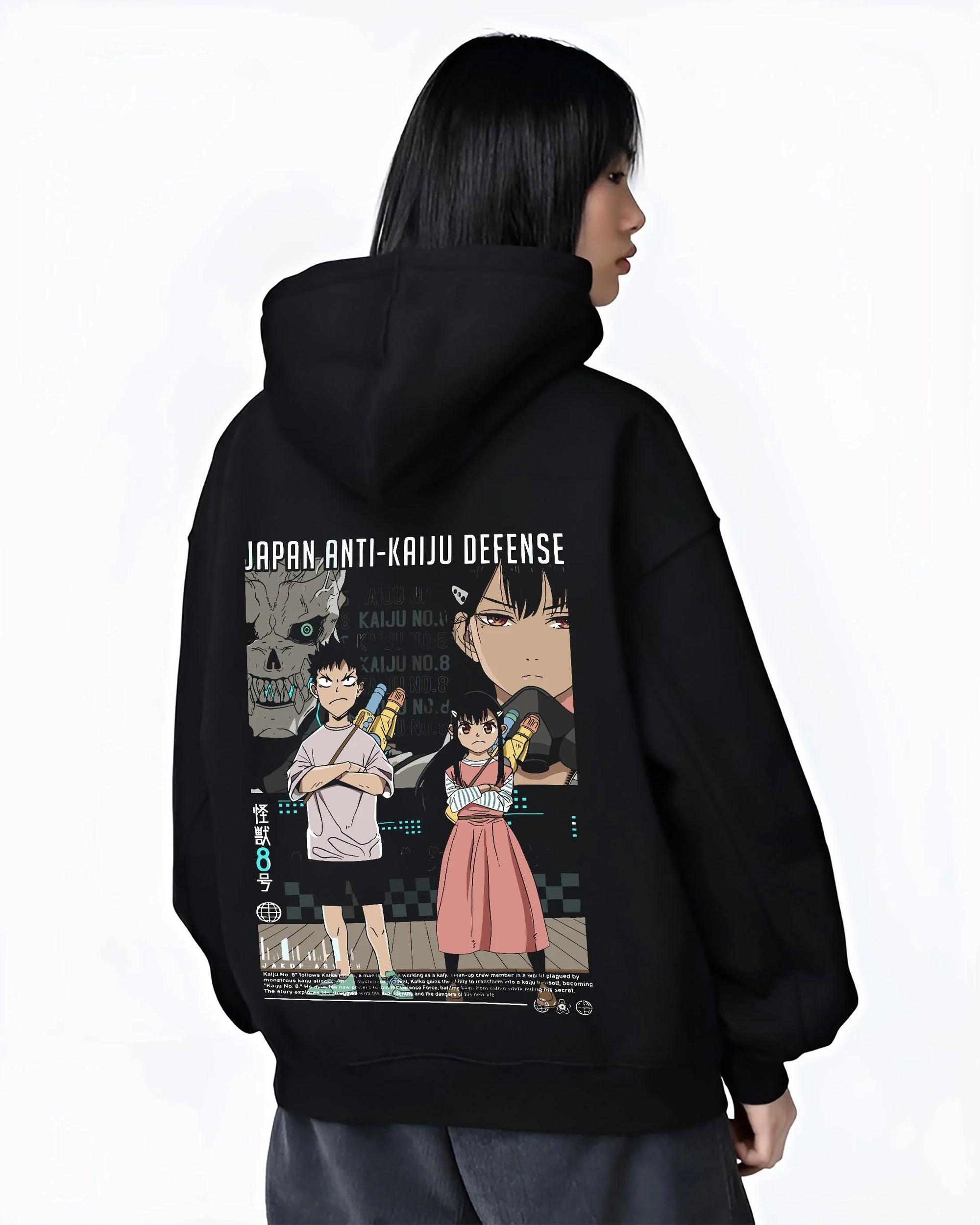 Black hoodie worn by female model, back view with Kaiju No. 8 Hoodie Defence Corps Protection Jumper graphic bold anime graphic.