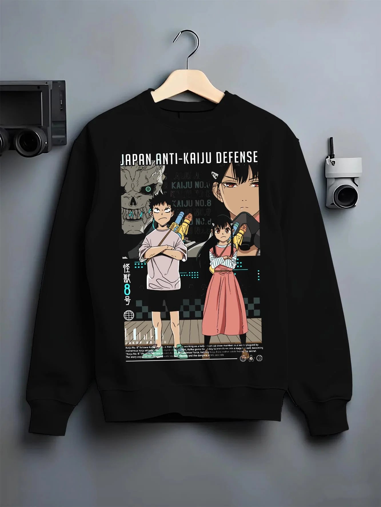 Black crewneck sweatshirt on hanger with Kaiju No. 8 Hoodie Defence Corps Protection Jumper graphic premium wear.