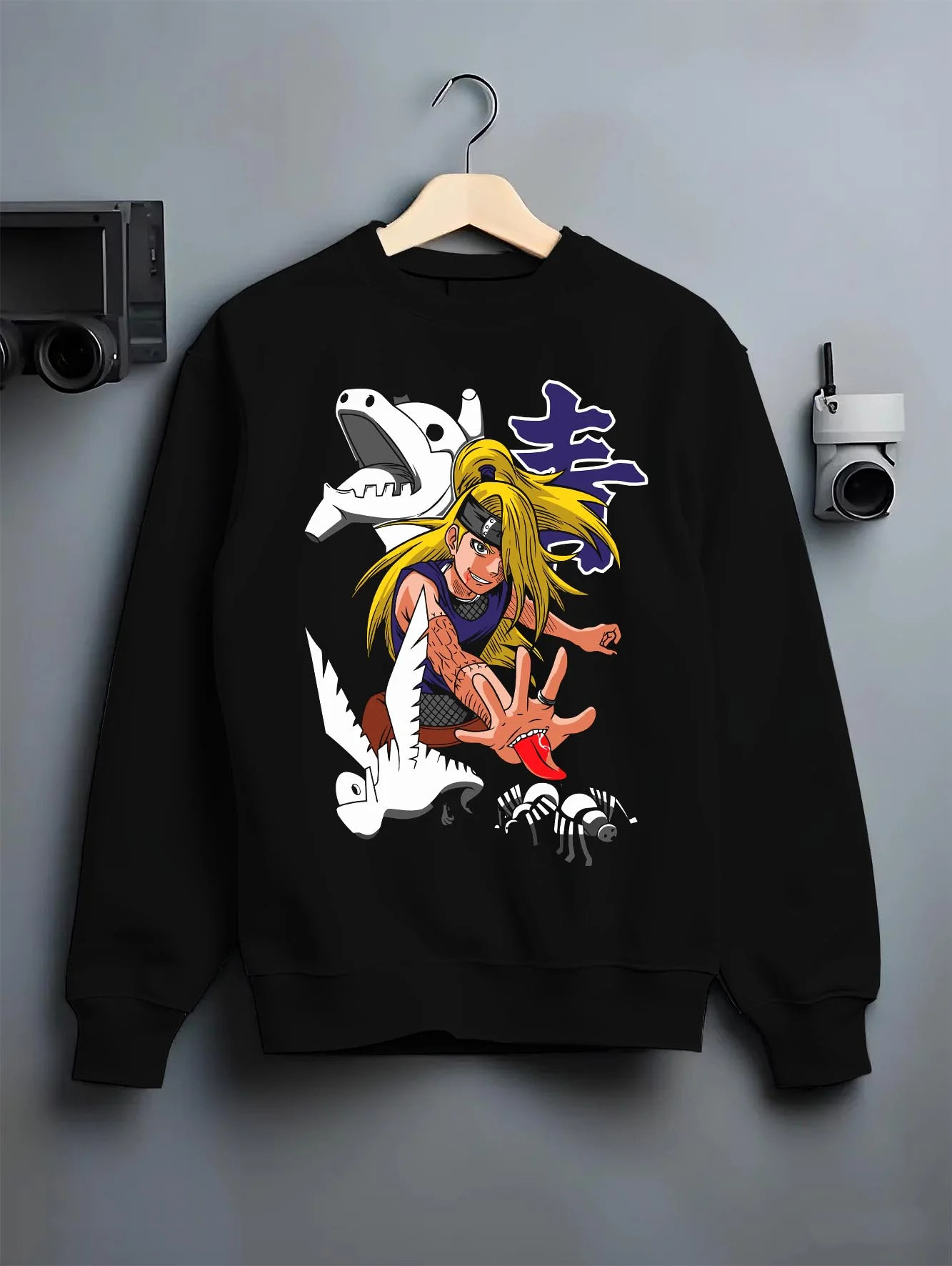 Black crewneck sweatshirt on hanger with Bleach Hoodie Rukia Soul Reaper Retro Anime Poster graphic streetwear graphic.