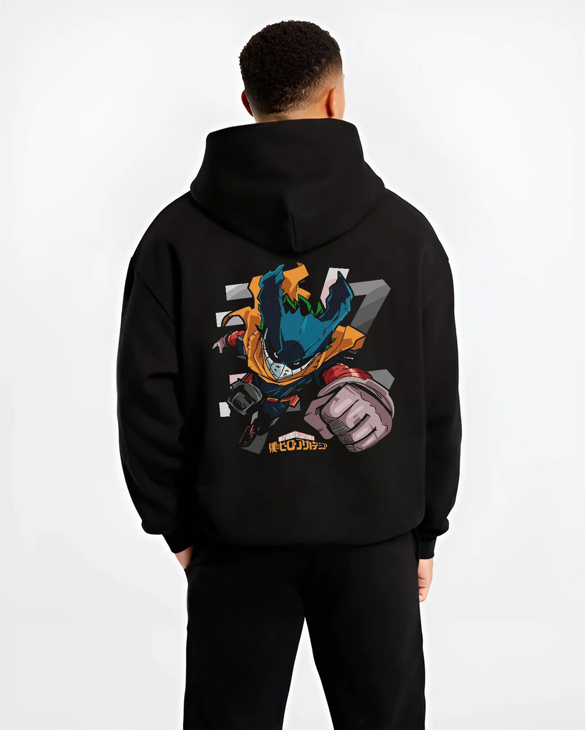Black hoodie model back view showing Deku from My Hero Academia: stylised chibi hero suit with extended fist