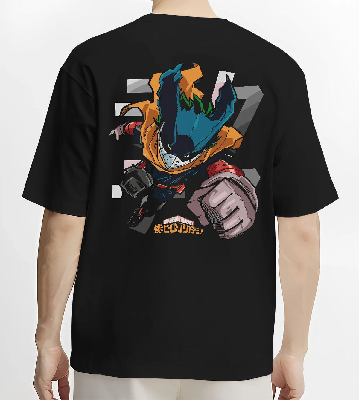 Black T-shirt model back view showing Deku from My Hero Academia: stylised chibi hero suit with extended fist