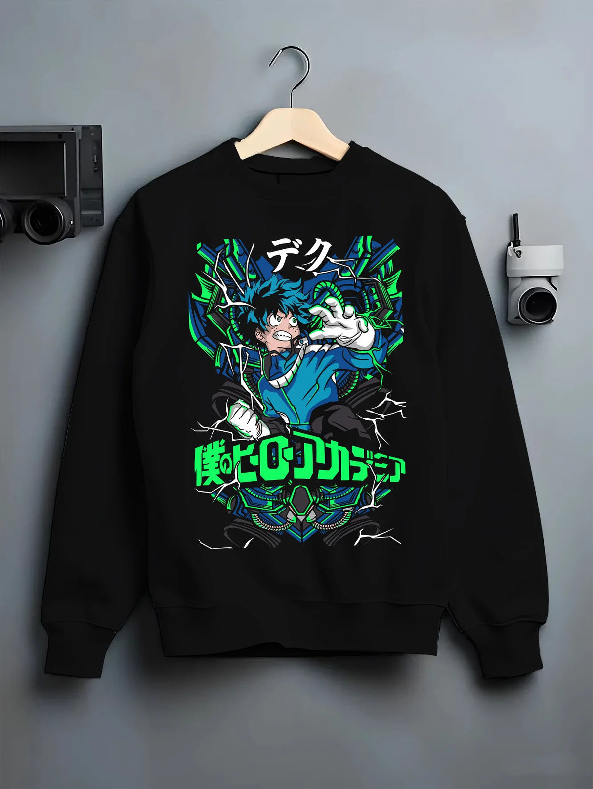 Black crewneck sweatshirt on hanger showing Deku from My Hero Academia: blue and green energy superhero composition