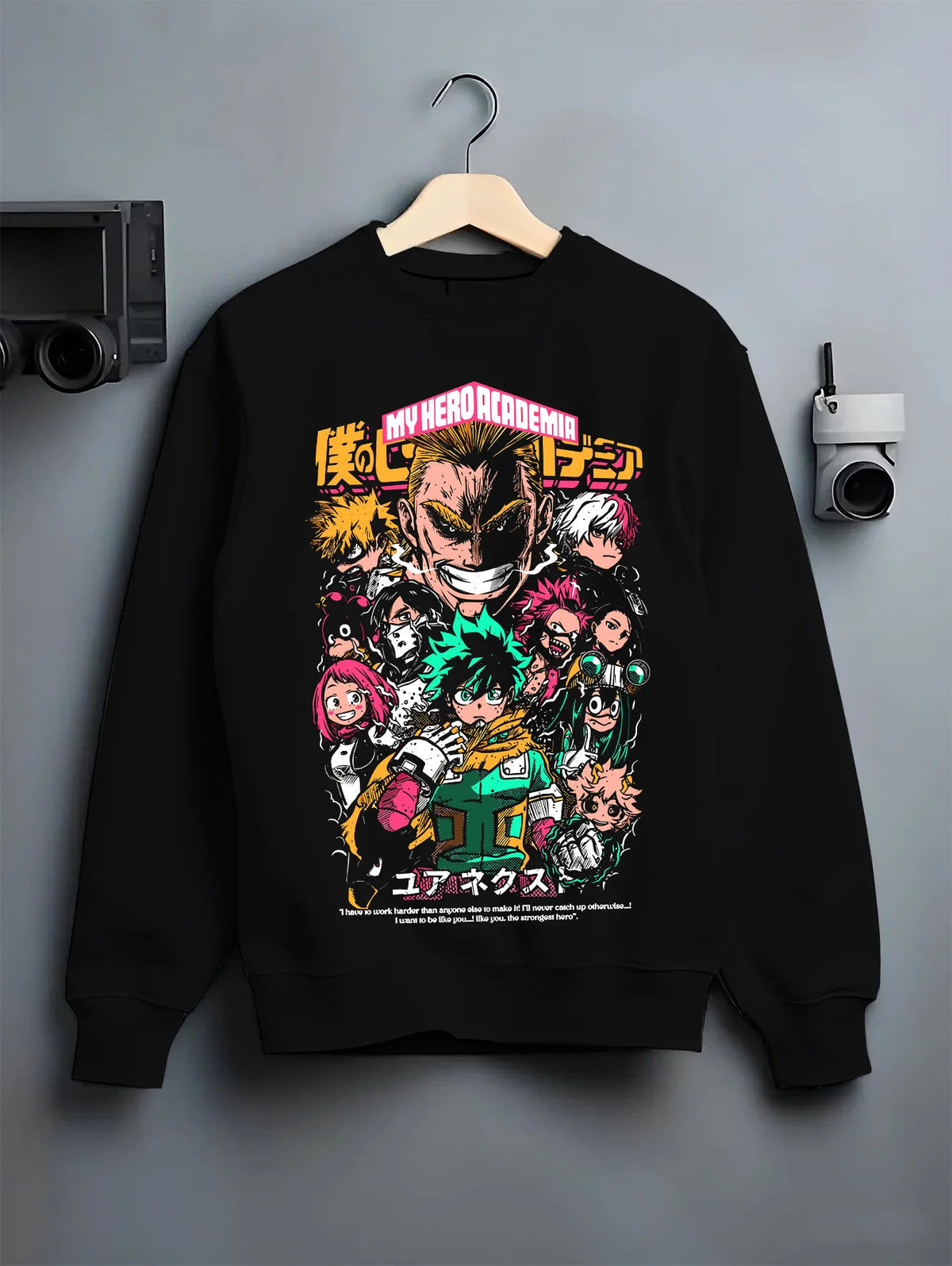 Black crewneck sweatshirt on hanger with My Hero Academia ensemble featuring All Might and Deku illustrated back graphic