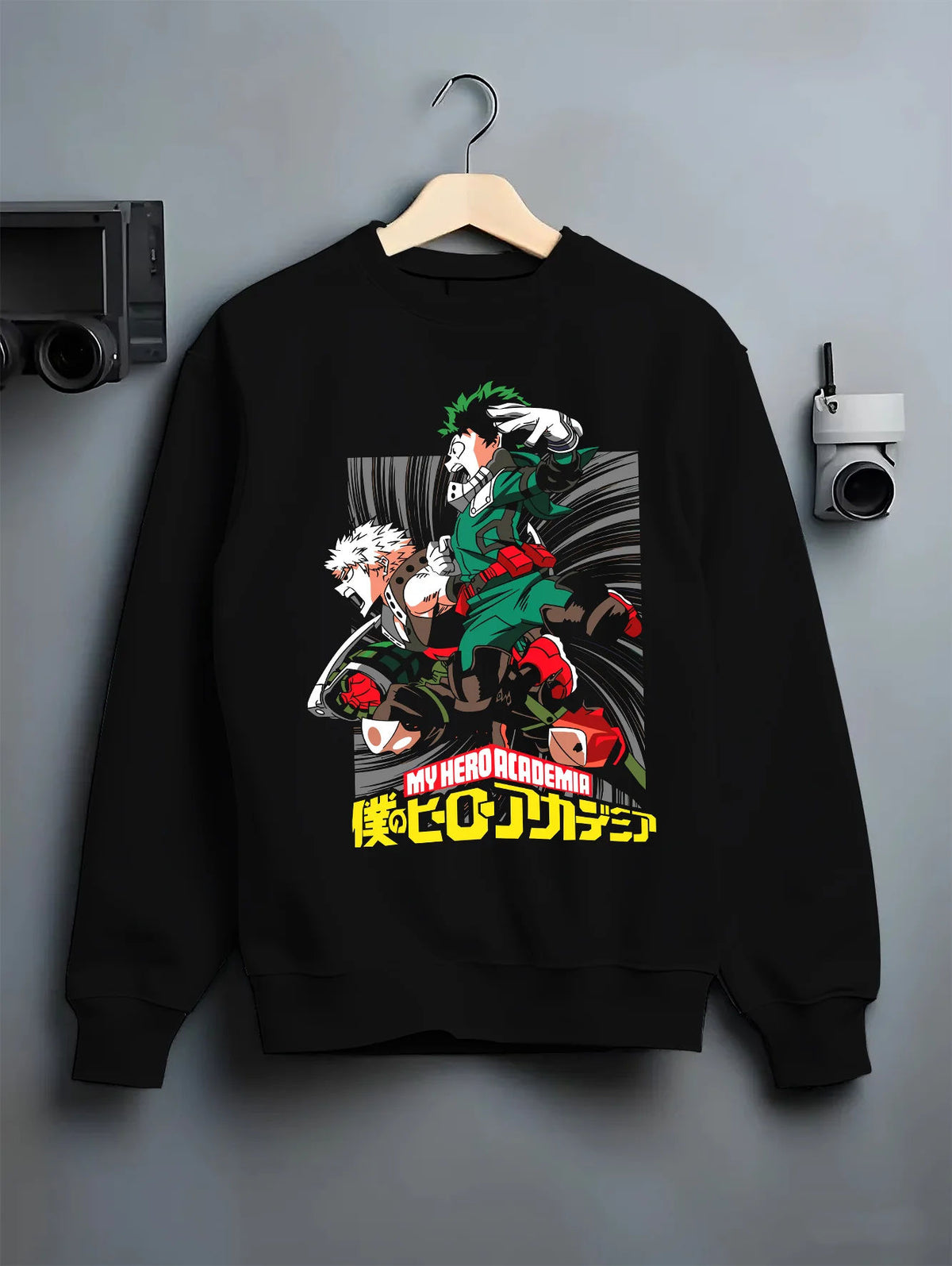Black crewneck sweatshirt on hanger showing Izuku Midoriya and Katsuki Bakugo from My Hero Academia: battle duo