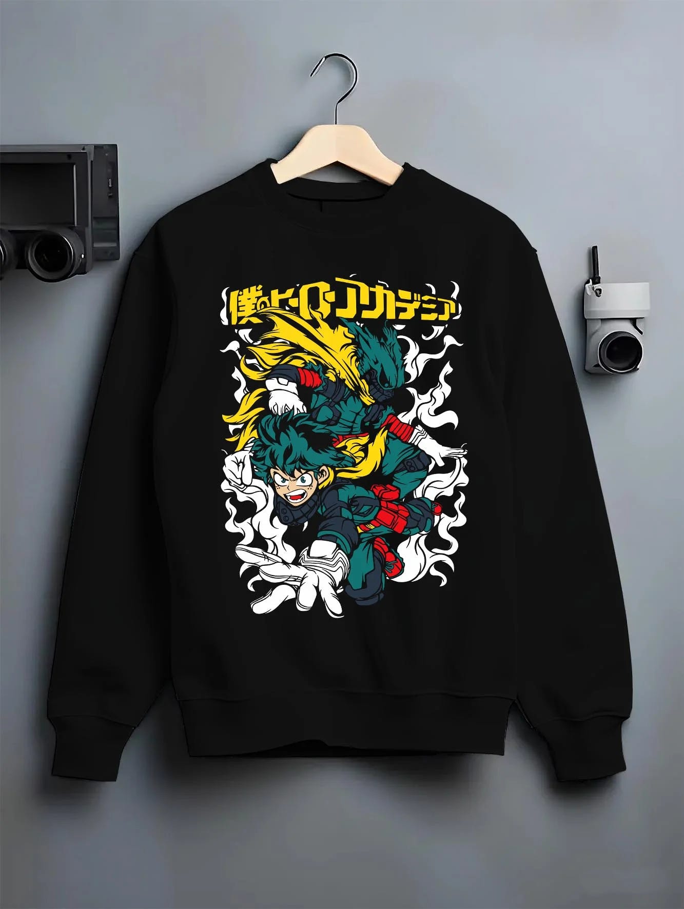 Black crewneck sweatshirt on hanger with Deku Hoodie My Hero Academia Full Power Smash Print graphic streetwear graphic.