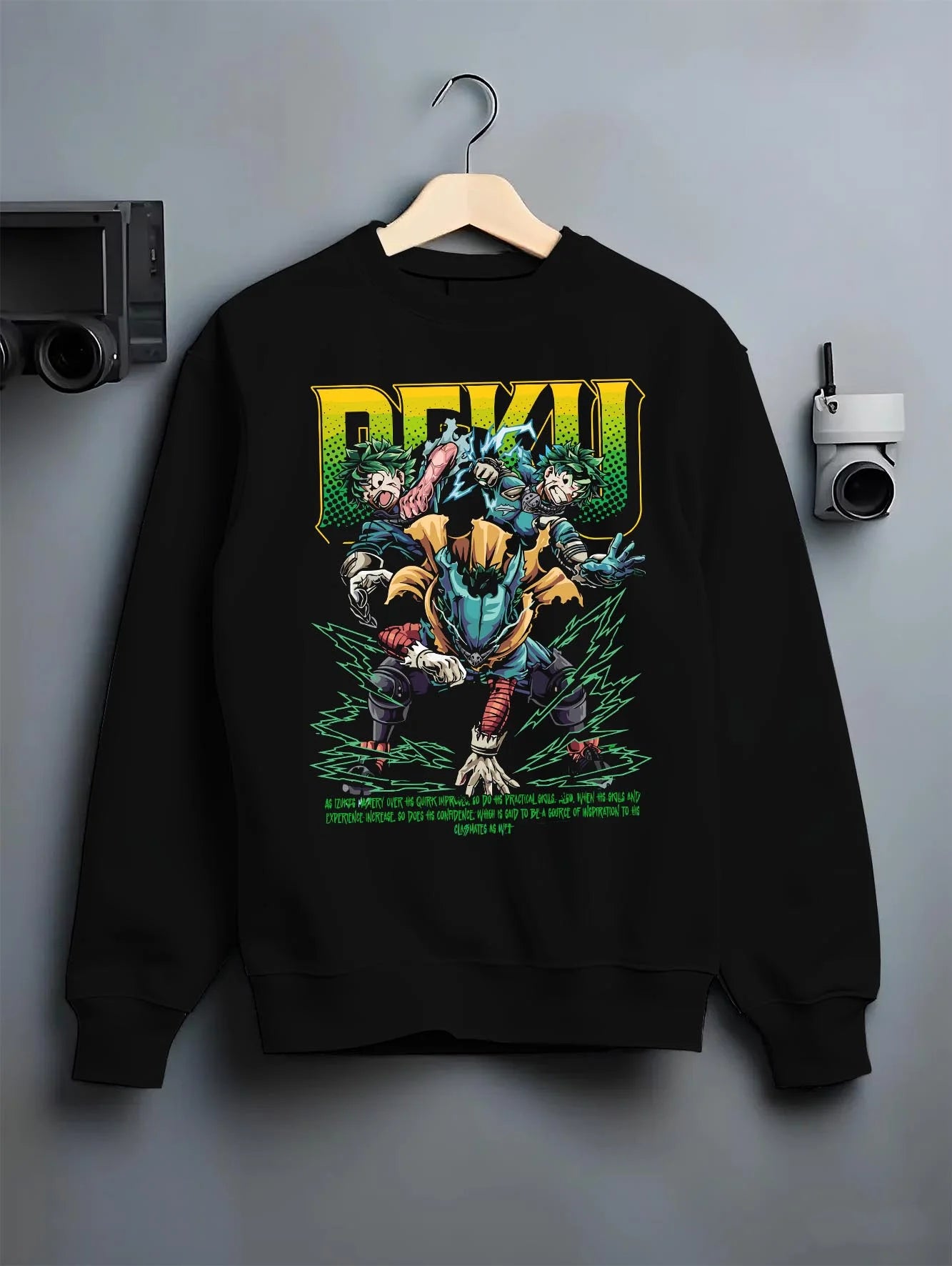 Black crewneck sweatshirt on hanger with Deku Hoodie My Hero Academia Villain Clash Retro Art graphic bold anime graphic.