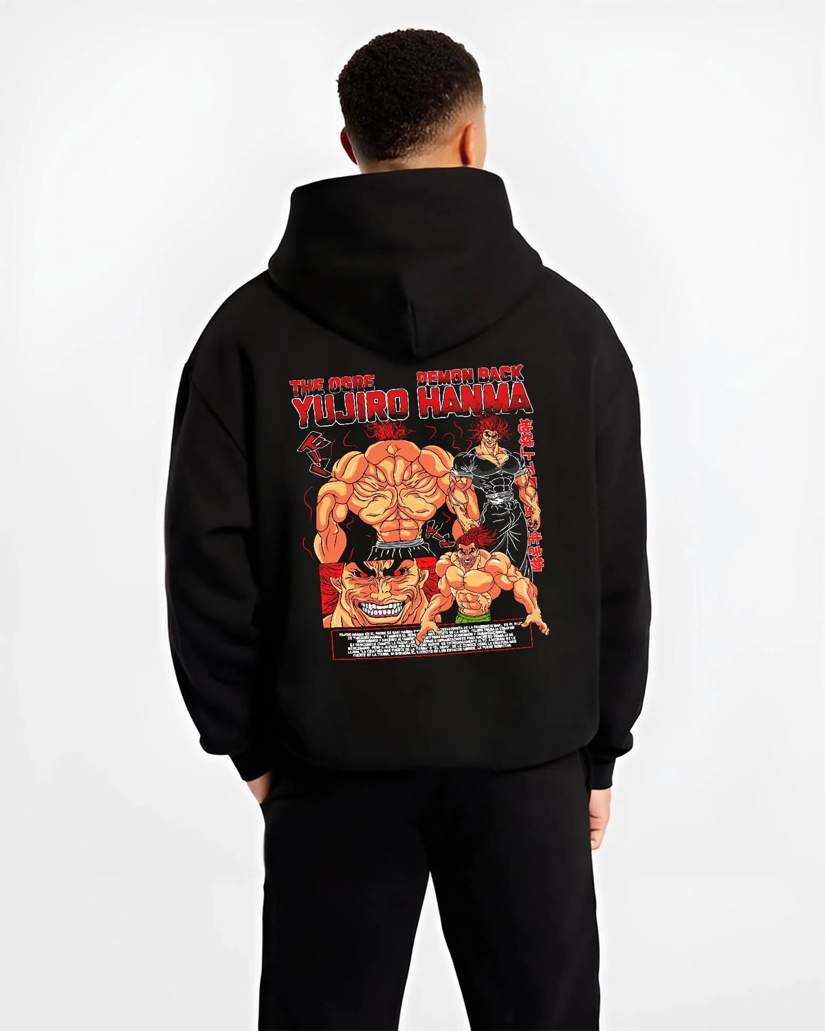 Black hoodie worn by male model from the back featuring Yujiro Hanma Baki demon back battle artwork.