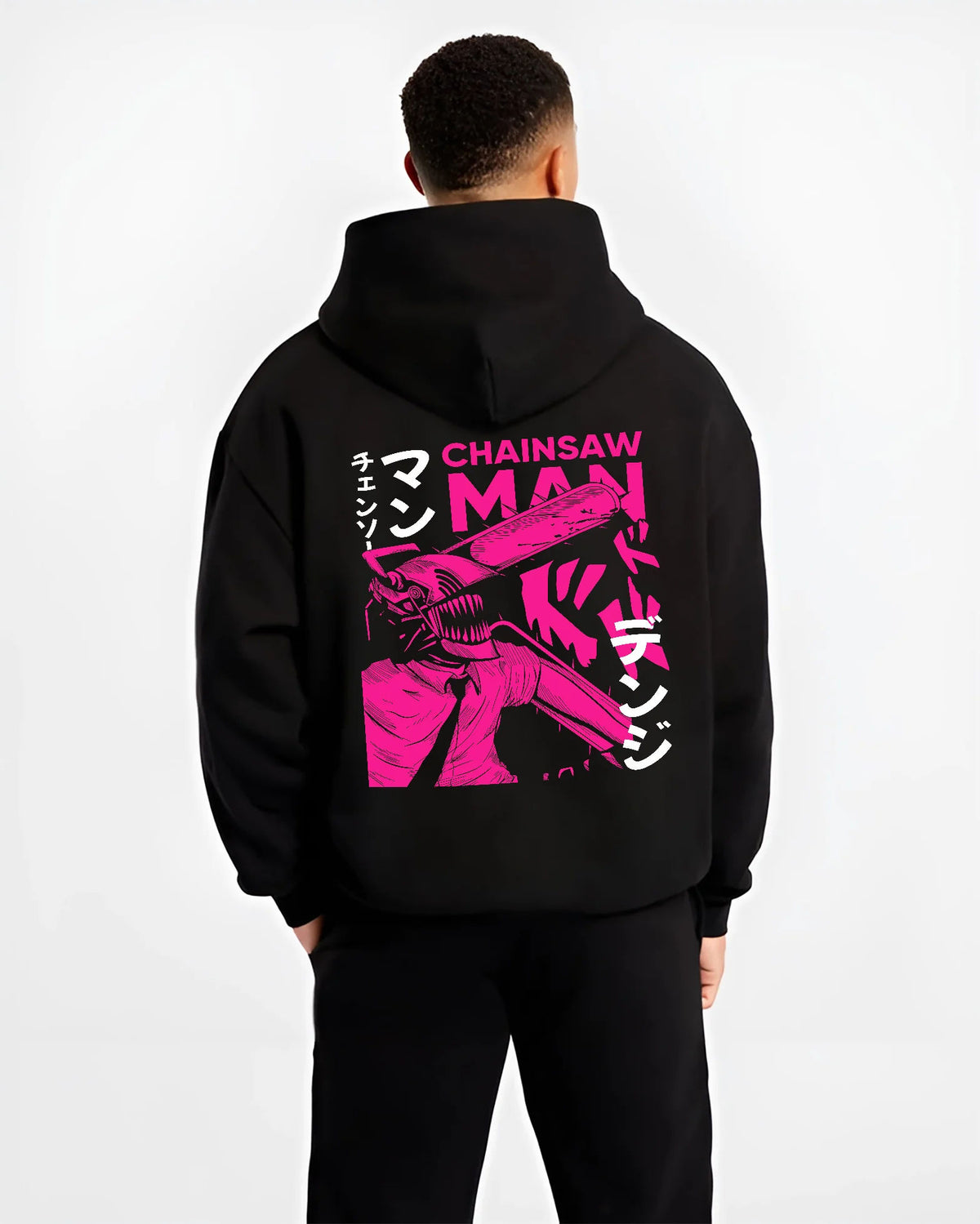 Black hoodie model back view showing Chainsaw Devil / Denji from Chainsaw Man: magenta chainsaw-head graphic
