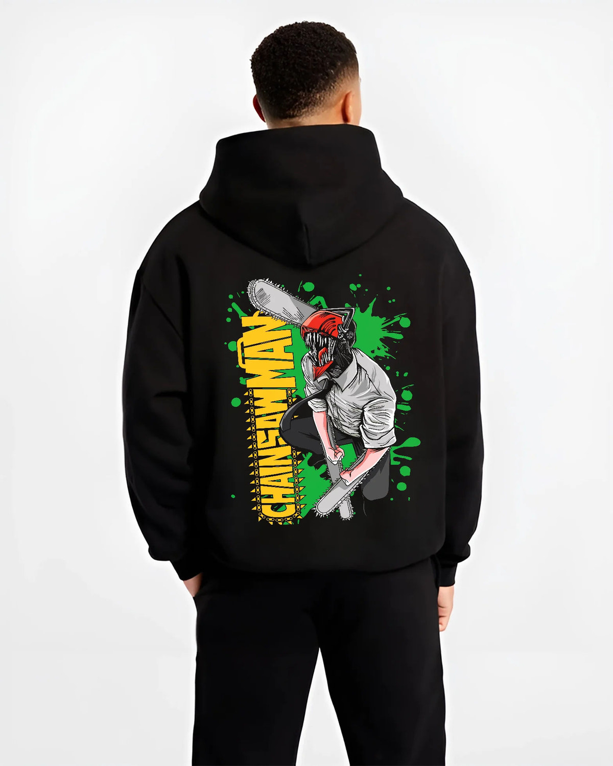 Black hoodie model back view showing Denji transformed from Chainsaw Man: chainsaw head and shirt, green background