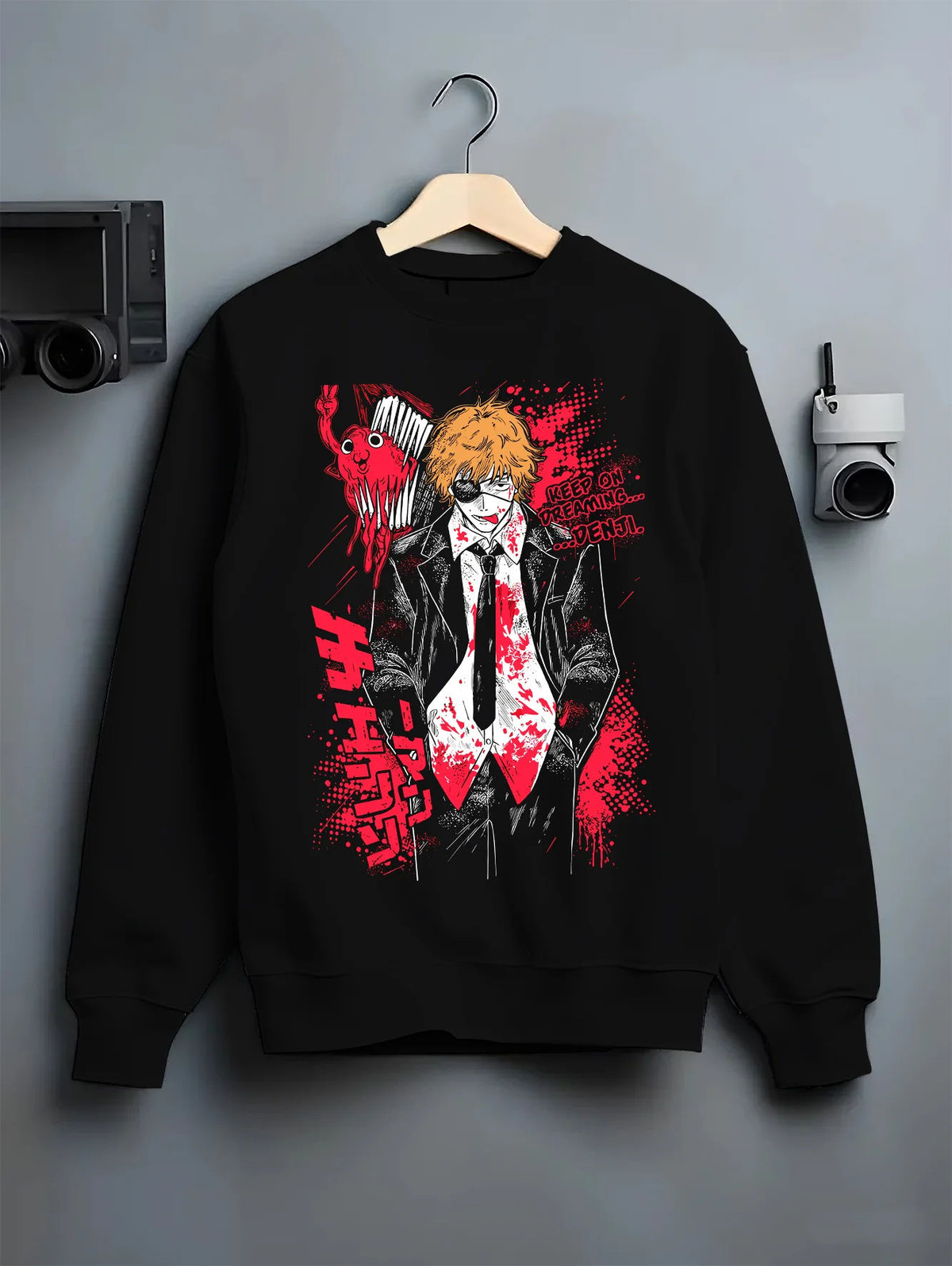 Black crewneck sweatshirt on hanger showing Denji from Chainsaw Man: bloody black suit and tie, Chainsaw Man