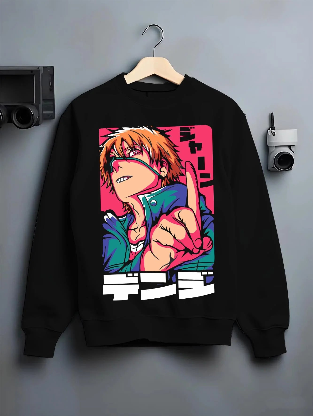 Black crewneck sweatshirt on hanger with Denji Chainsaw Man chainsaw devil hunter cyberpunk anime aesthetic artwork.