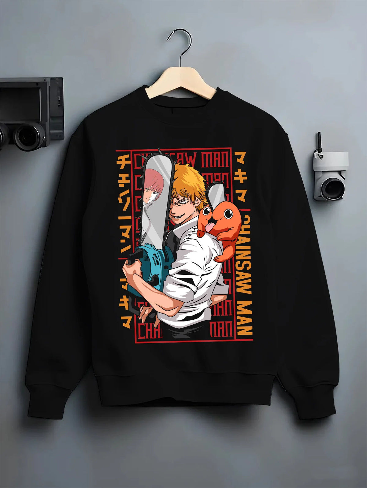 Black crewneck sweatshirt on hanger with Denji with Pochita, chainsaw and Makima-inspired backdrop from Chainsaw Man