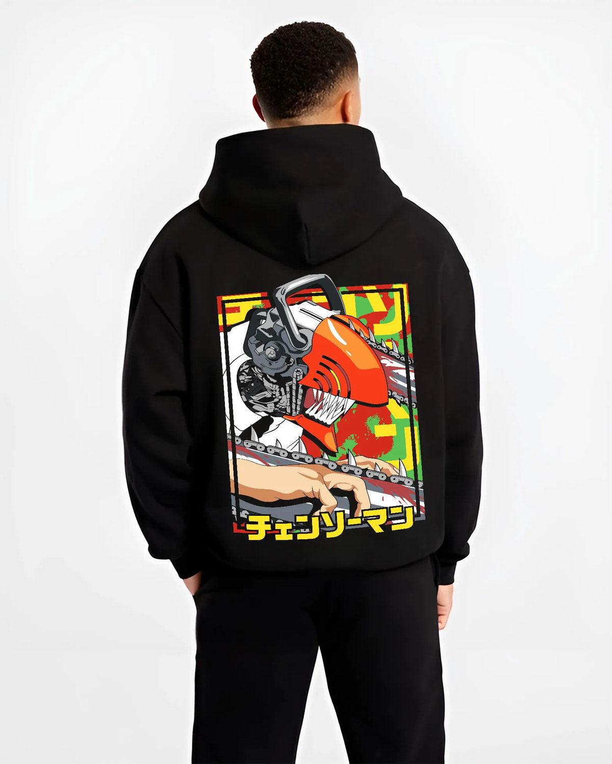 Black hoodie model back view showing Chainsaw Devil / Denji from Chainsaw Man: orange mechanical saw-head pose