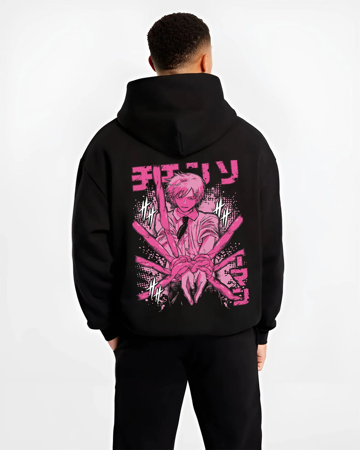 Black hoodie model back view showing Denji / Chainsaw Man character: pink manga-style portrait
