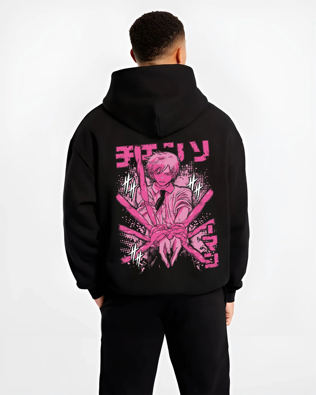 Black hoodie model back view showing Denji / Chainsaw Man character: pink manga-style portrait