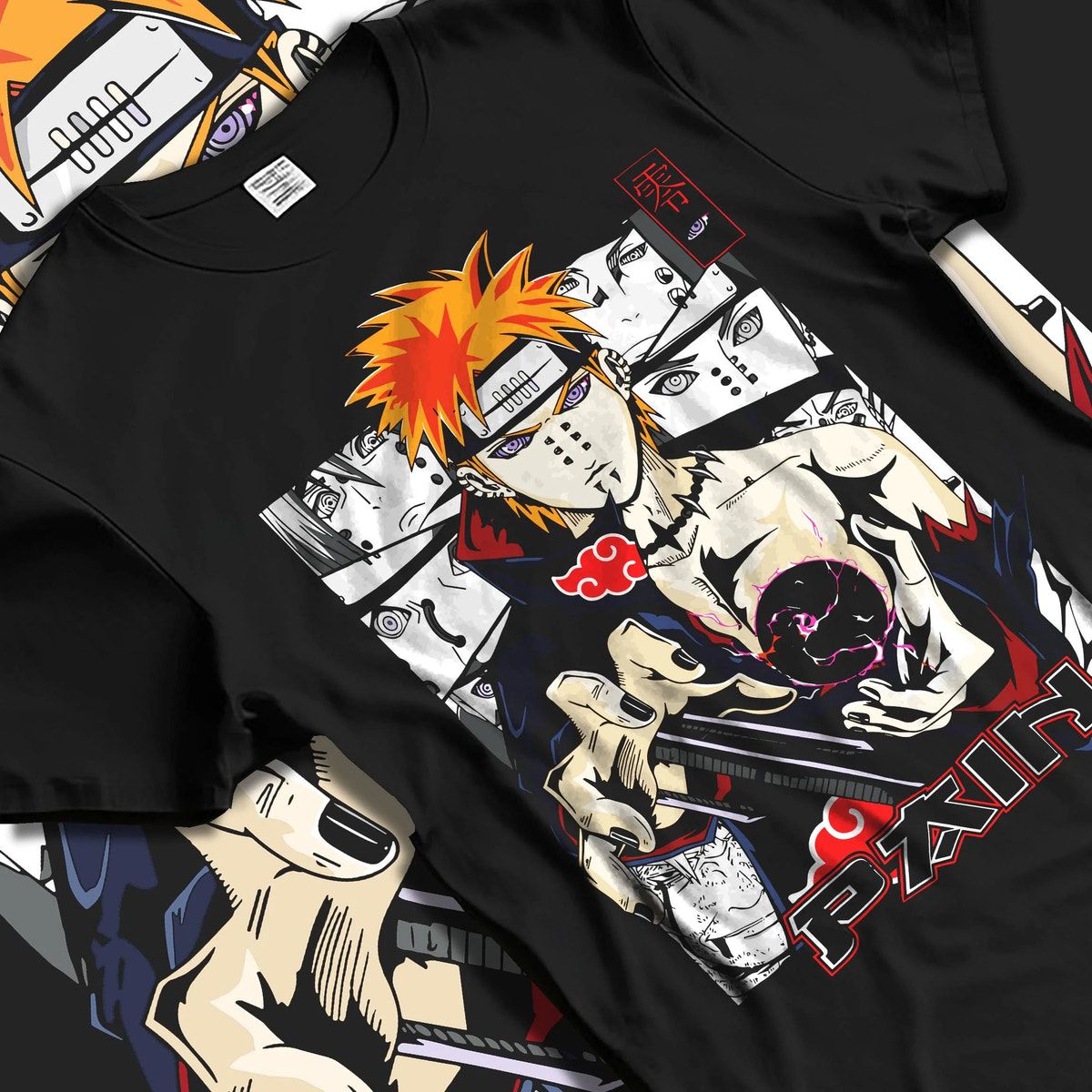 Black T-shirt laid flat with natural folds featuring Pain Naruto Akatsuki Rinnegan Six Paths artwork.