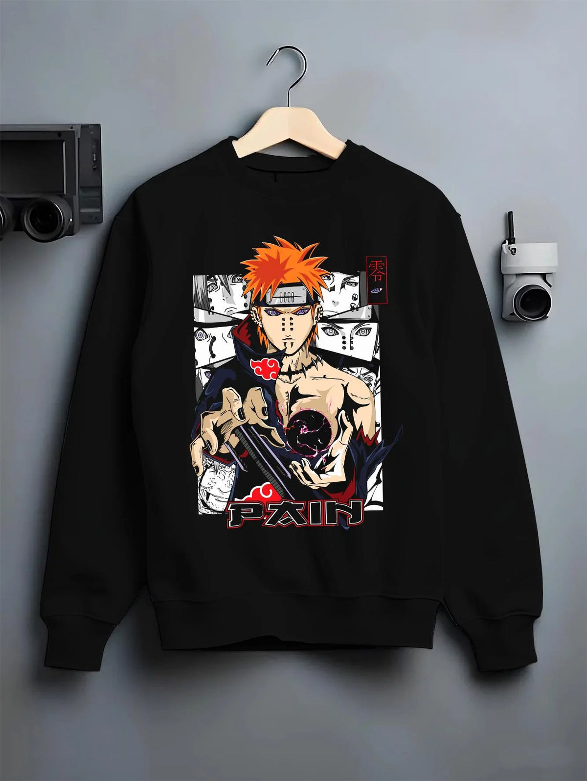 Black crewneck sweatshirt on hanger featuring Pain Naruto Akatsuki Rinnegan Six Paths artwork.