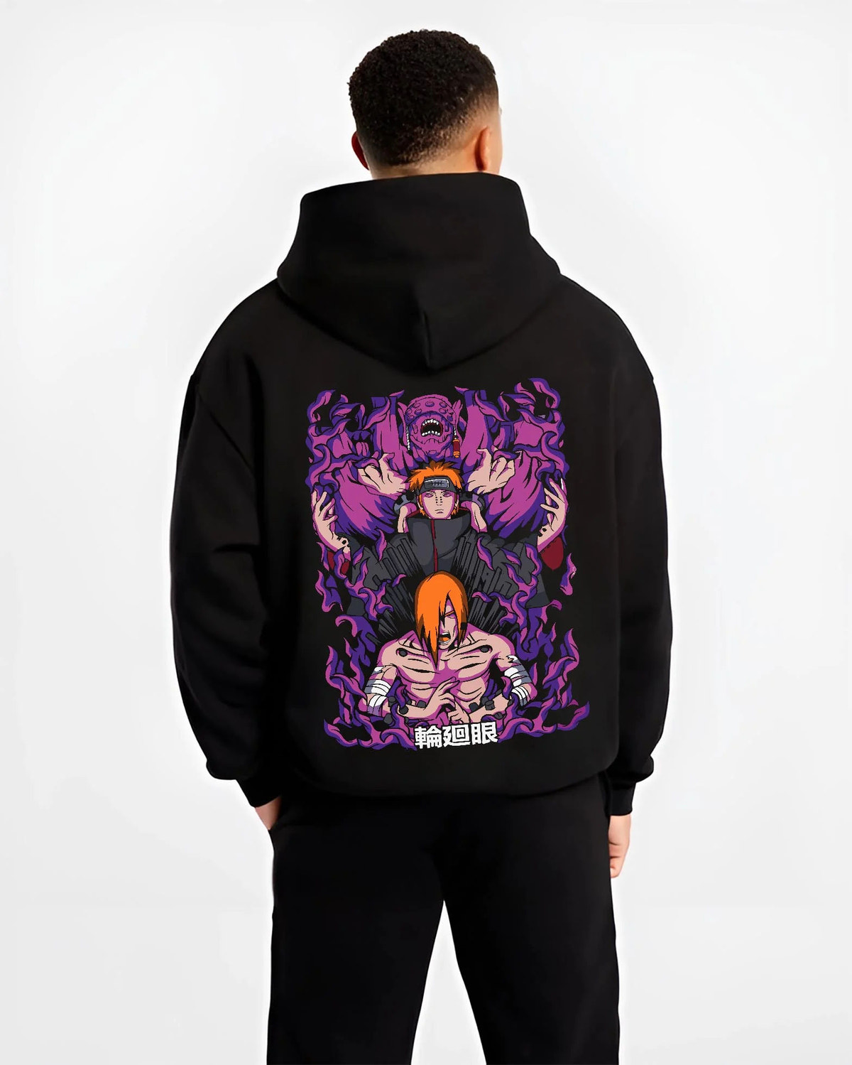 Black hoodie worn by male model from the back featuring Pain Naruto Deva Path Almighty Push artwork.
