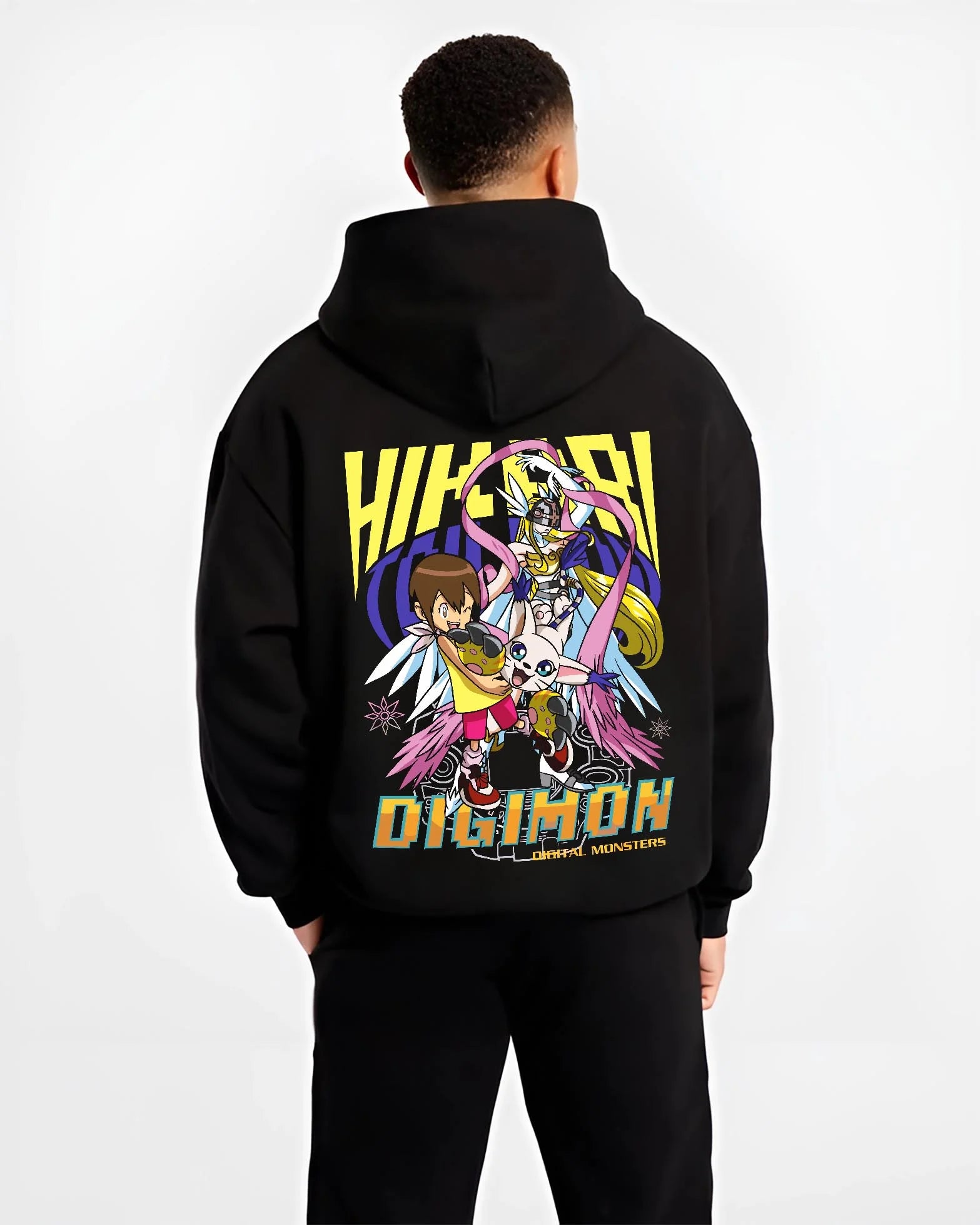 Black hoodie worn by male model, back view with Digimon Hoodie Kari with Gatomon Retro Partner Print graphic streetwear graphic.