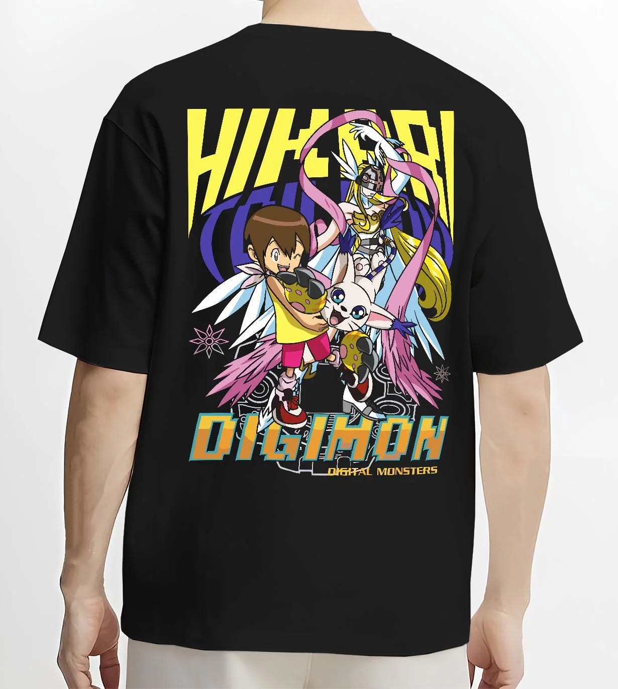 Black T-shirt worn by male model, back view with Digimon Hoodie Kari with Gatomon Retro Partner Print graphic premium wear.