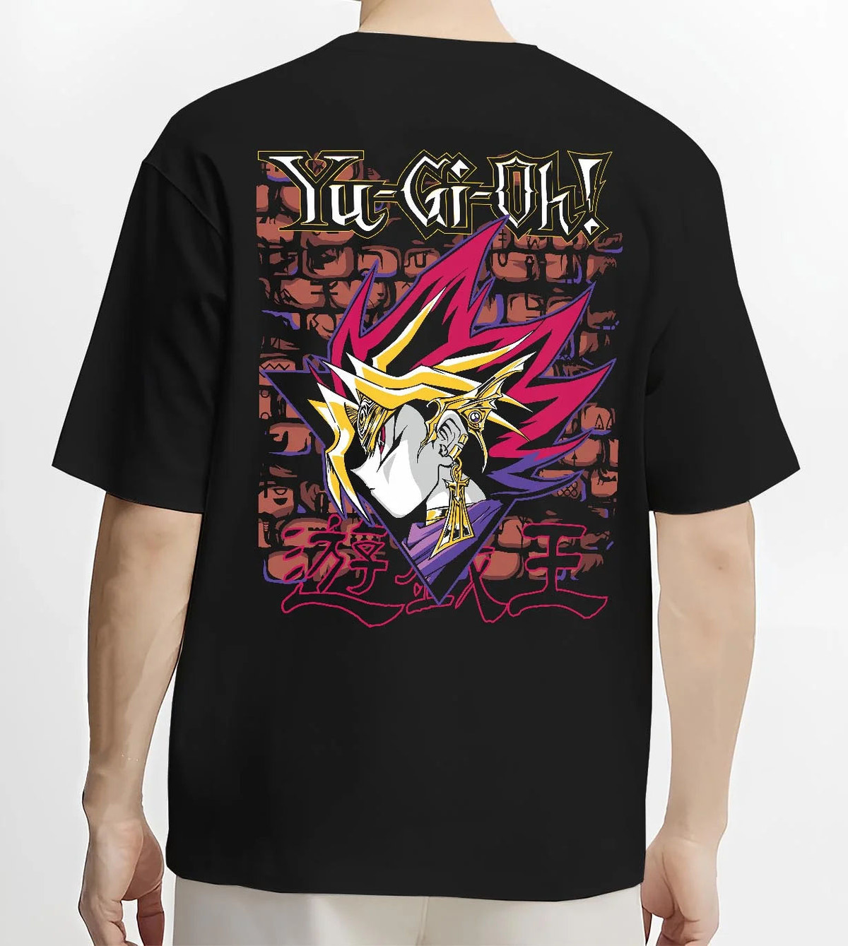 Black T-shirt worn by male model from the back featuring Dark Magician Yu-Gi-Oh duel monster artwork.