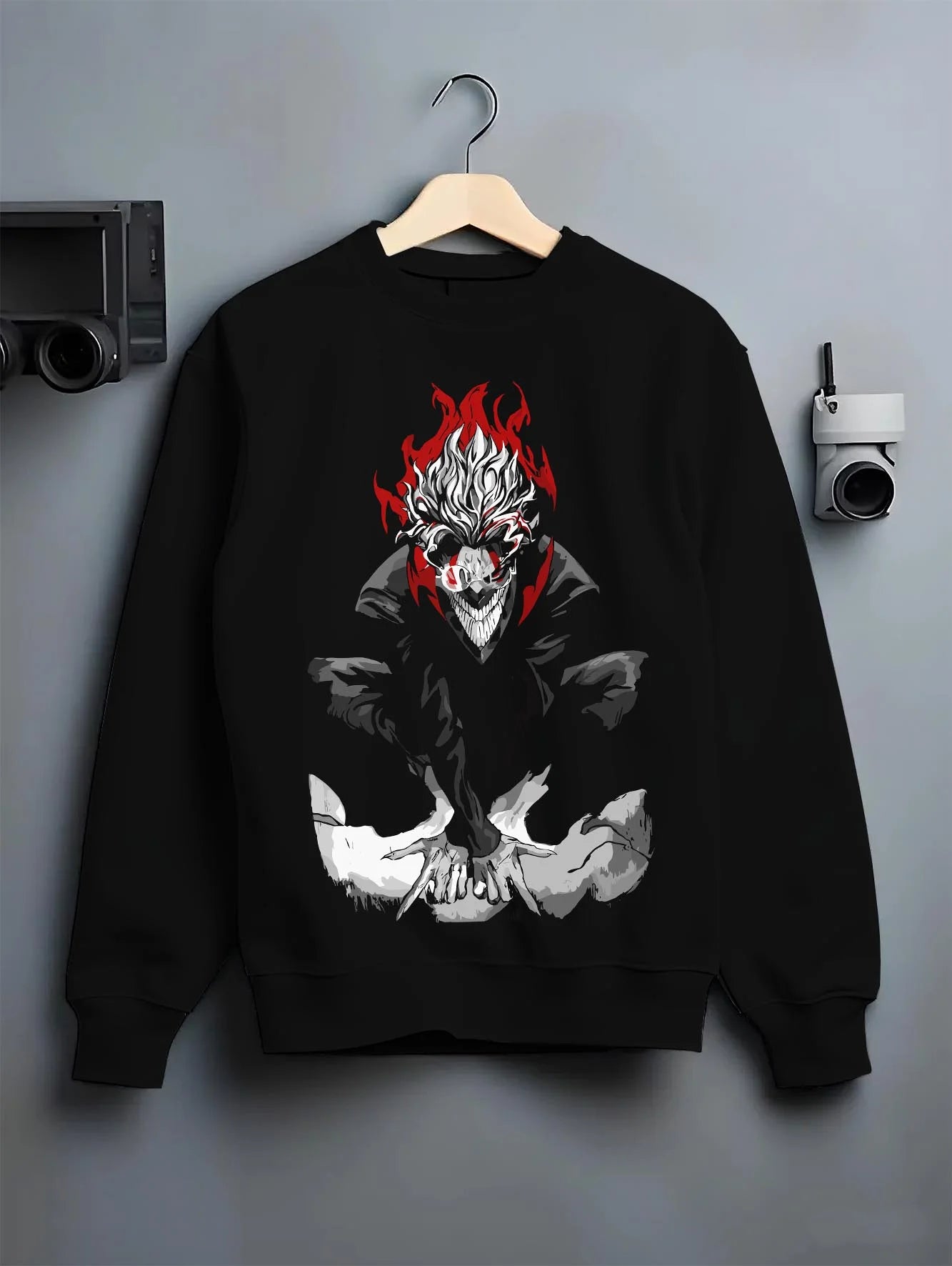 Black crewneck sweatshirt on hanger with Dandadan Hoodie Spirit Okarun Paranormal Retro Art graphic premium wear.