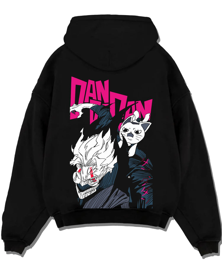 Black pullover hoodie laid flat with Dandadan Hoodie Hero Transformation Retro Anime Art graphic premium wear.