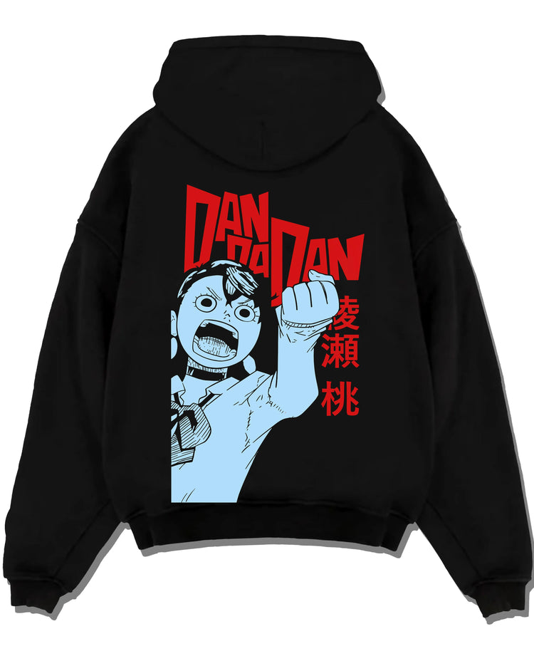 Black pullover hoodie laid flat with Dandadan Hoodie Momo Ayase Paranormal Retro Poster graphic bold anime graphic.