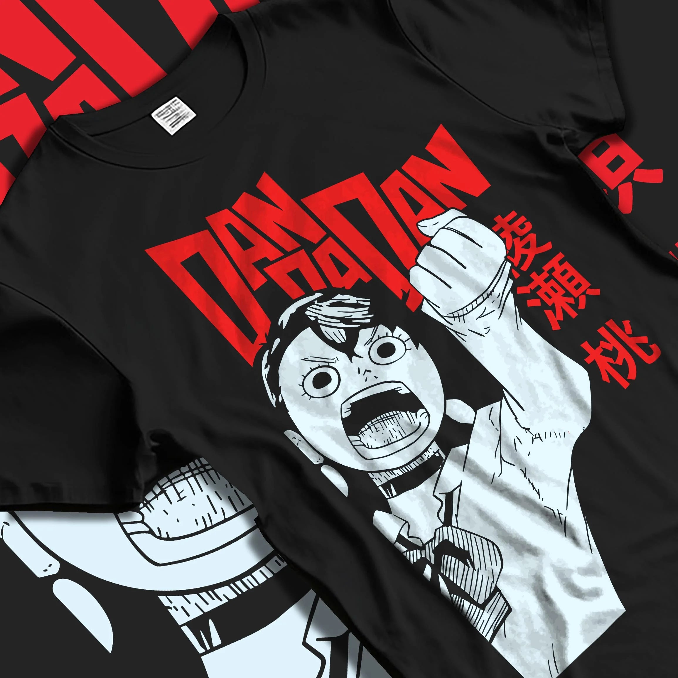 Black T-shirt laid flat with natural folds with Dandadan Hoodie Momo Ayase Paranormal Retro Poster graphic streetwear graphic.