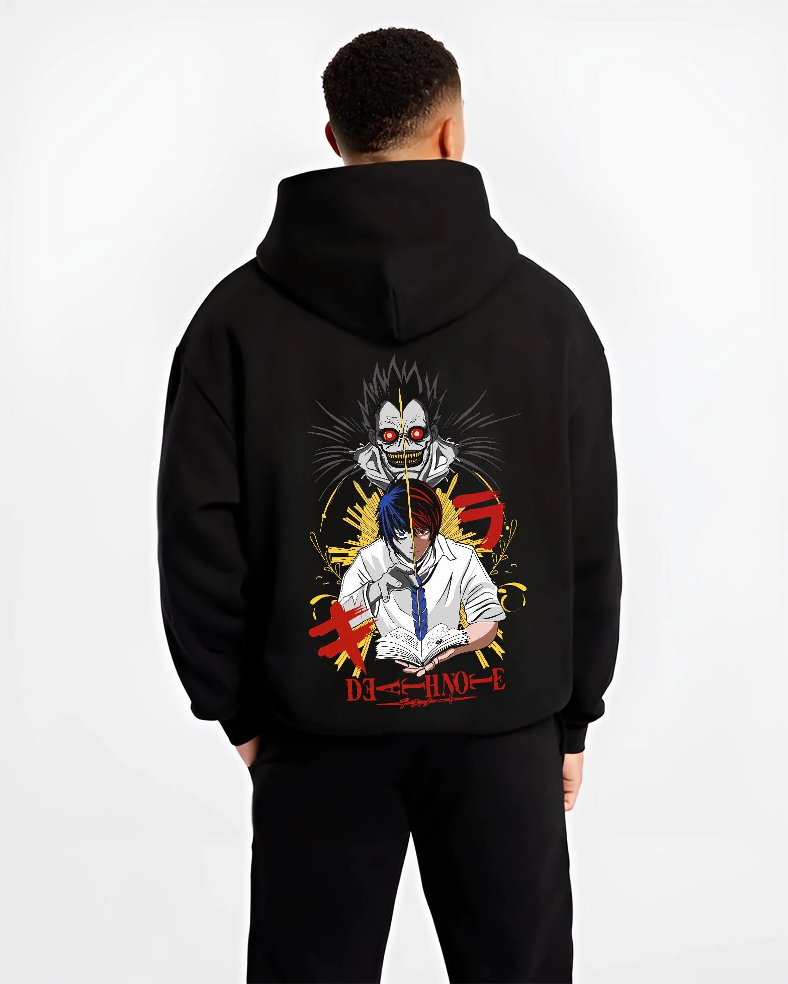 Black hoodie worn by male model, back view with Ryuk Hoodie Death Note Retro Anime Shinigami Poster graphic streetwear graphic.