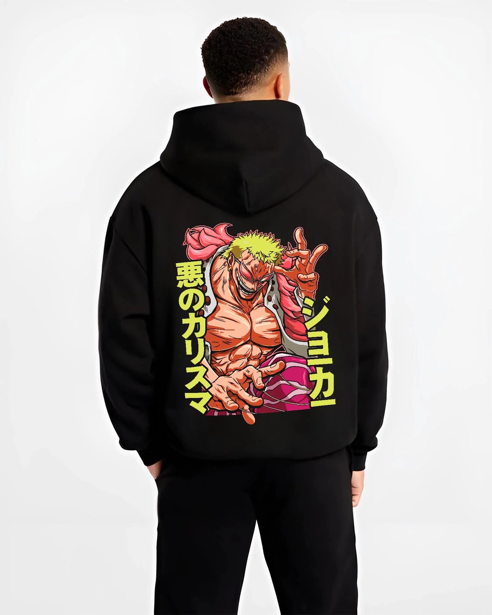 Black hoodie worn by male model, back view with Doflamingo Hoodie One Piece Retro Villain Pose Art graphic bold anime graphic.