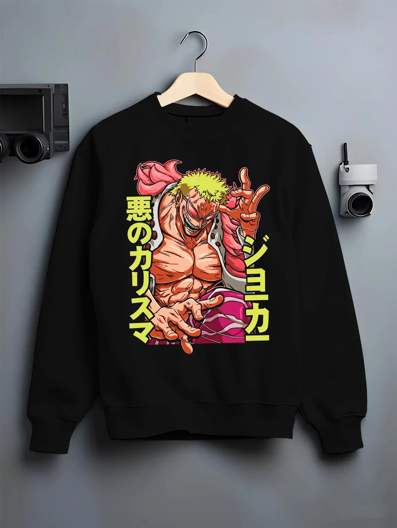 Black crewneck sweatshirt on hanger with Doflamingo Hoodie One Piece Retro Villain Pose Art graphic streetwear graphic.