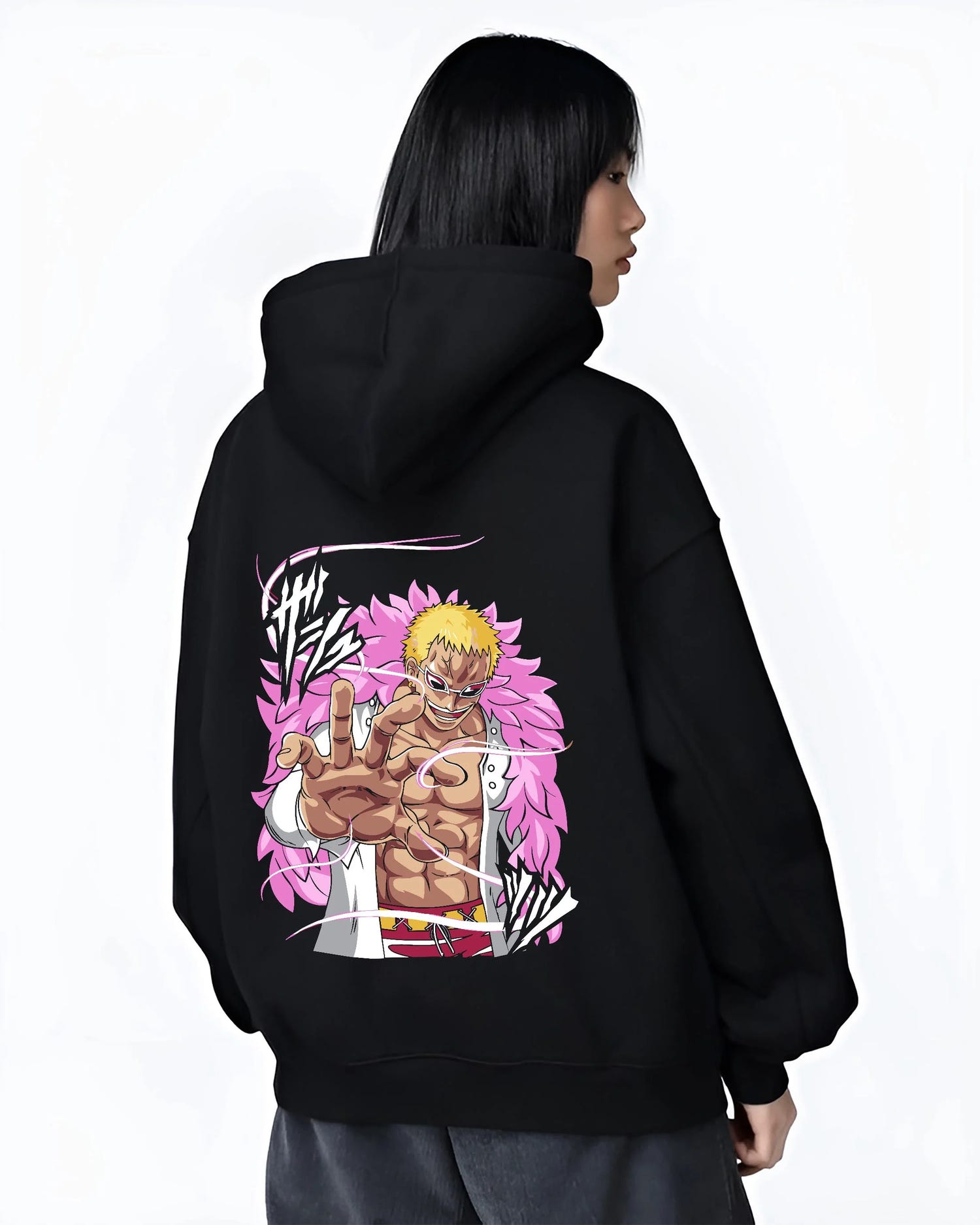 Black hoodie worn by female model, back view with Doflamingo Hoodie One Piece Villain Charisma Poster graphic bold anime graphic.
